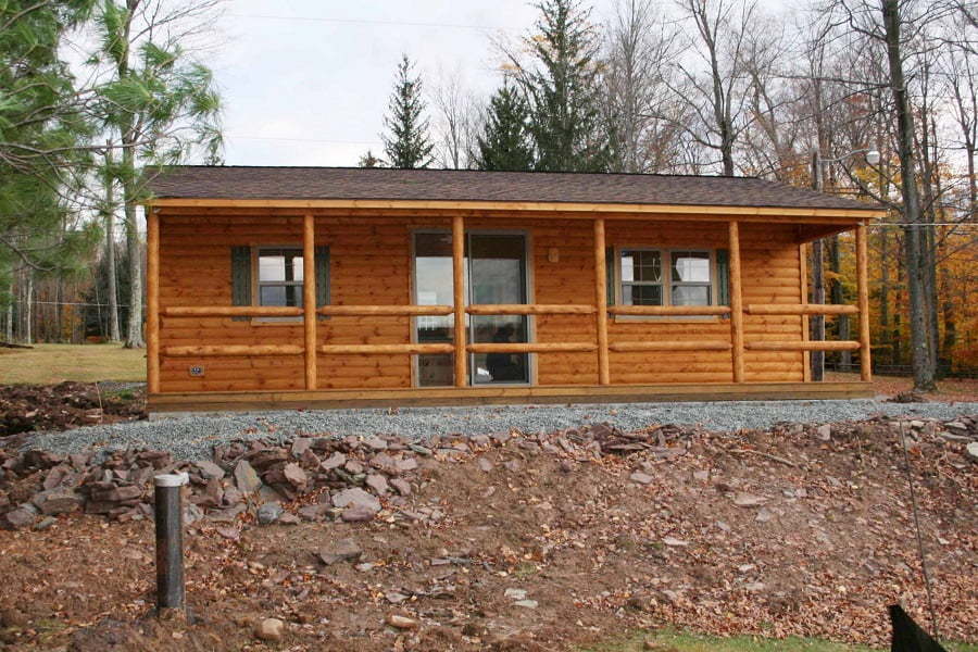 mobile home that looks like log cabin