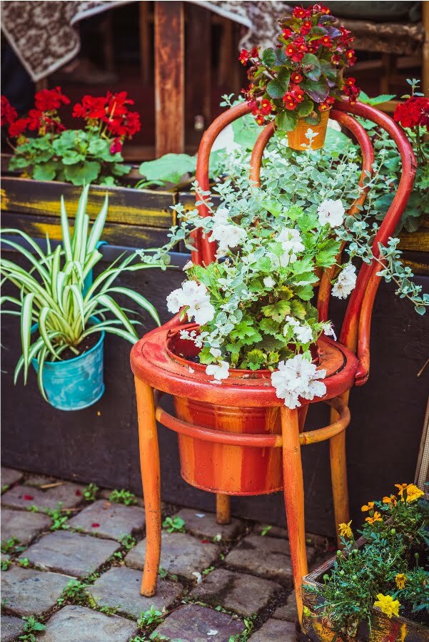 recycled chair garden planter