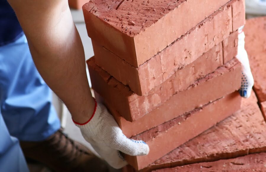 lifting bricks