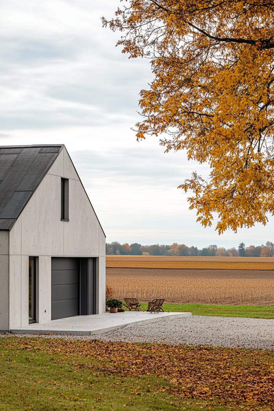 modern 90s house with concrete facade cozy front porch and metal garage door picturesque farmland fields in autumn in the background 1