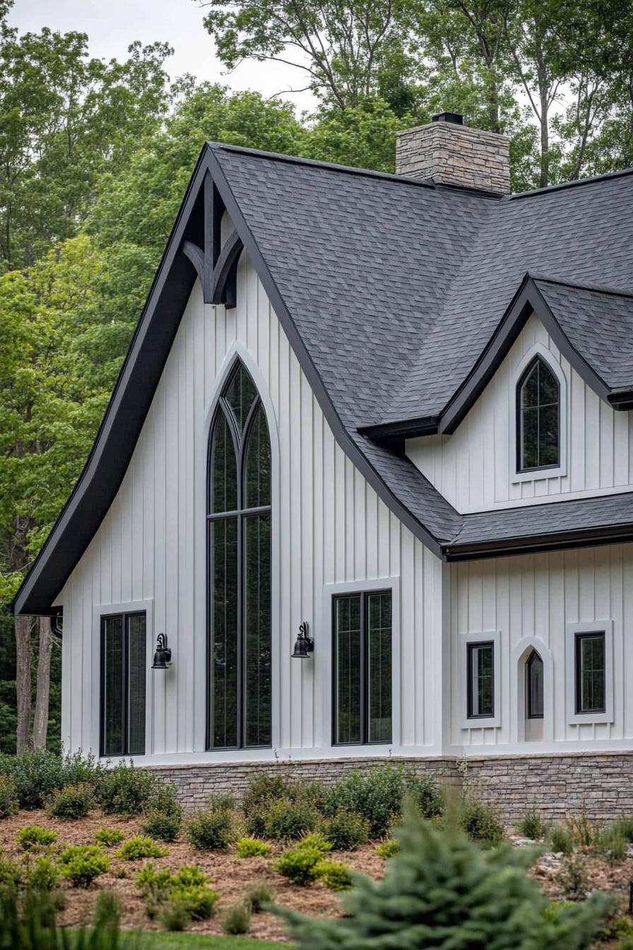 White Gothic-style house with tall windows set in a lush green landscape