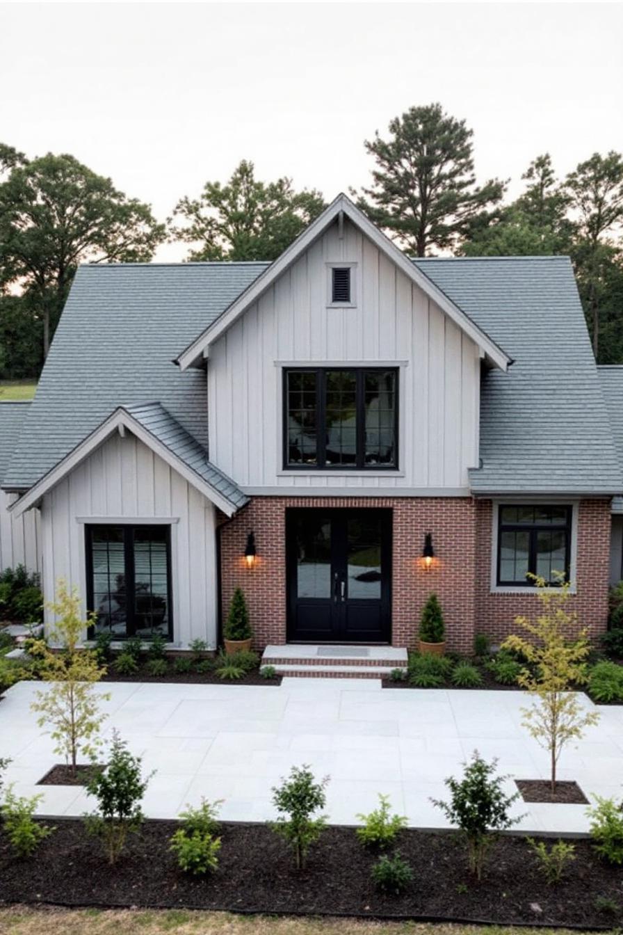 Farmhouse with a mix of shingle roof and brick facade