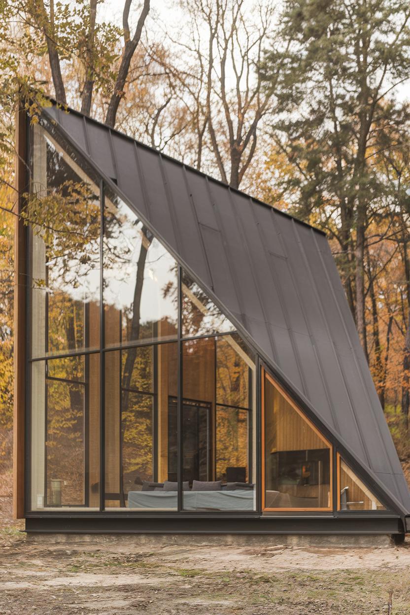 A-Frame house surrounded by autumn trees