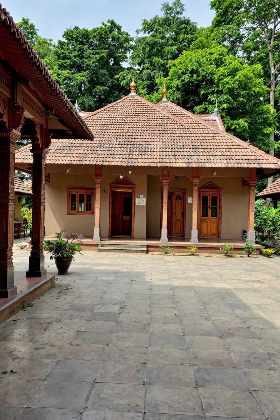 Kerala-style house with a sloped roof and wooden accents