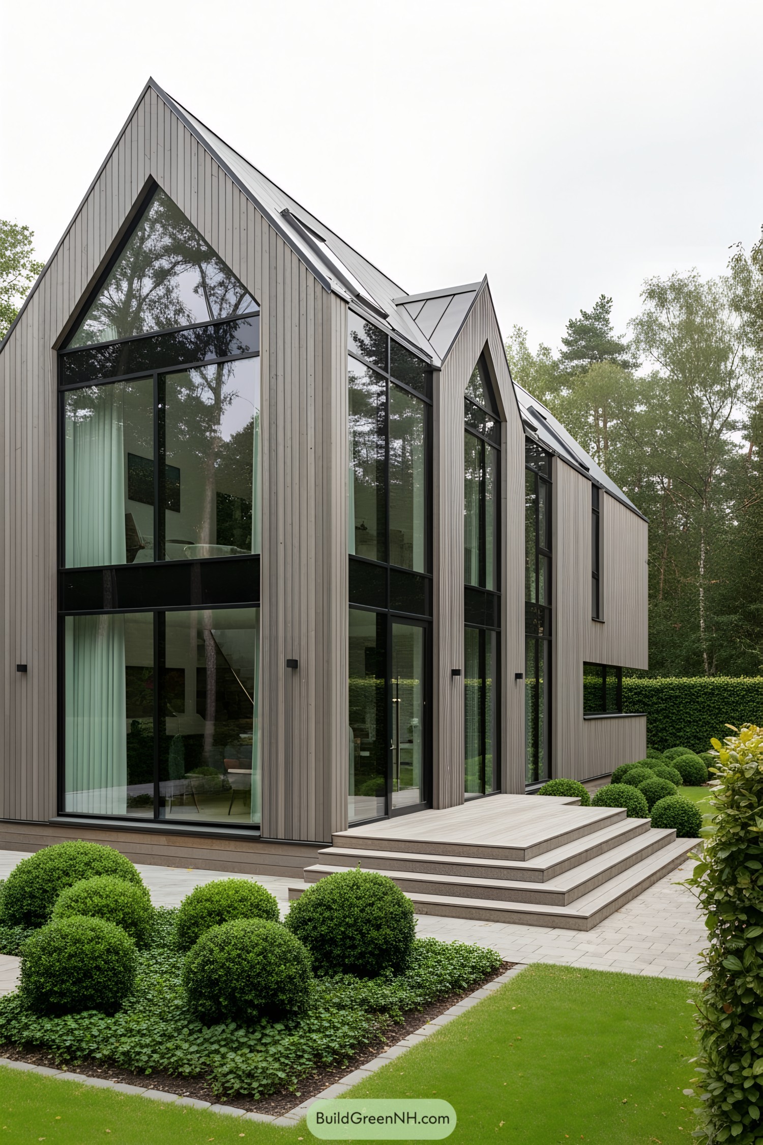 Modern Scandinavian farmhouse with large windows and angular roof