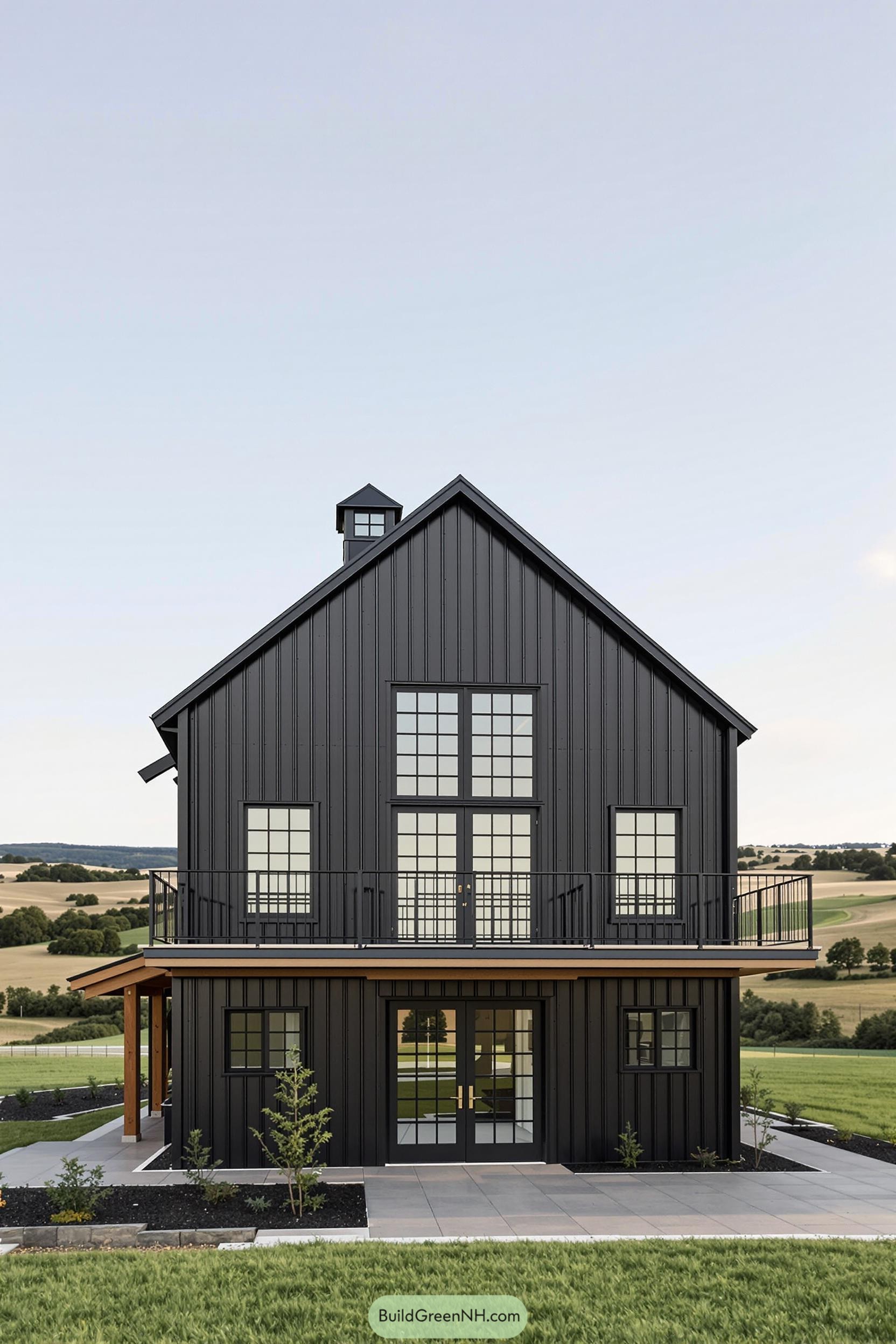 Elegant modern black barn with large windows
