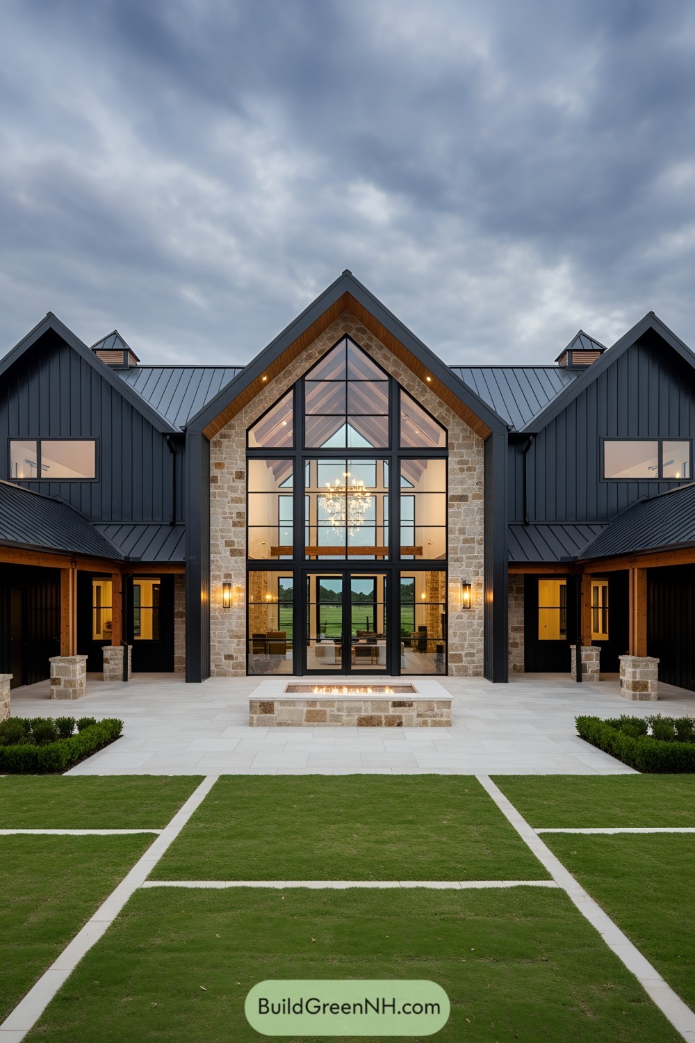 Spacious barndominium with large windows and stone accents
