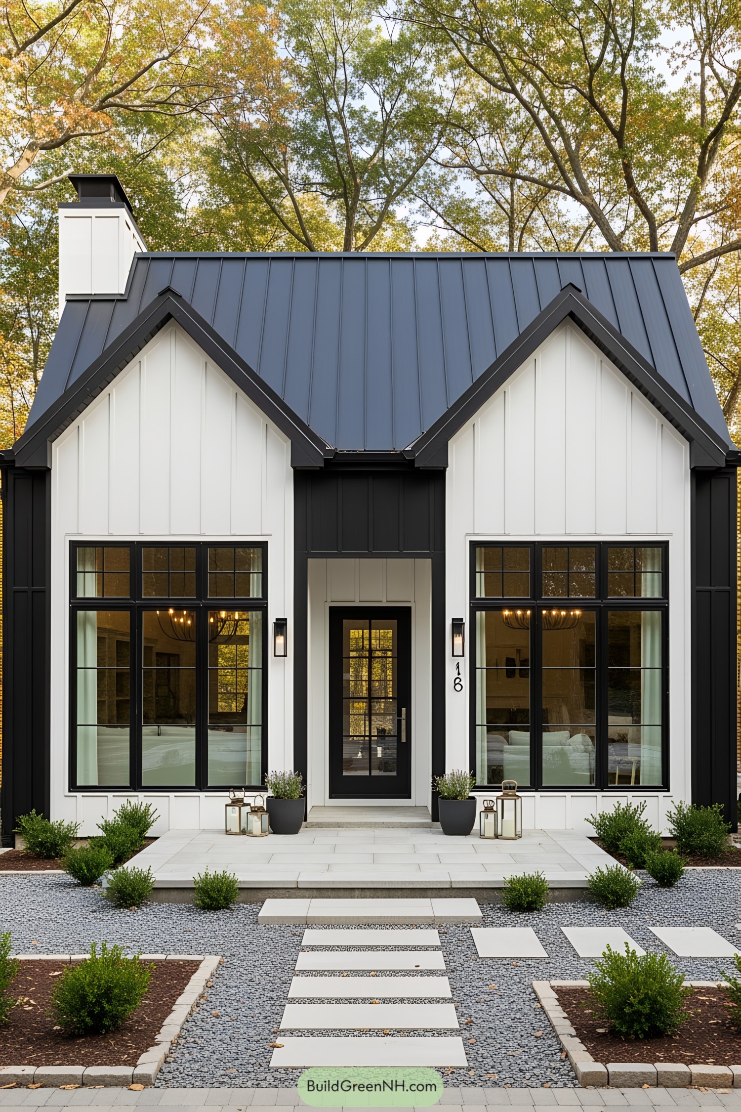 Modern black and white bungalow with a chic entrance
