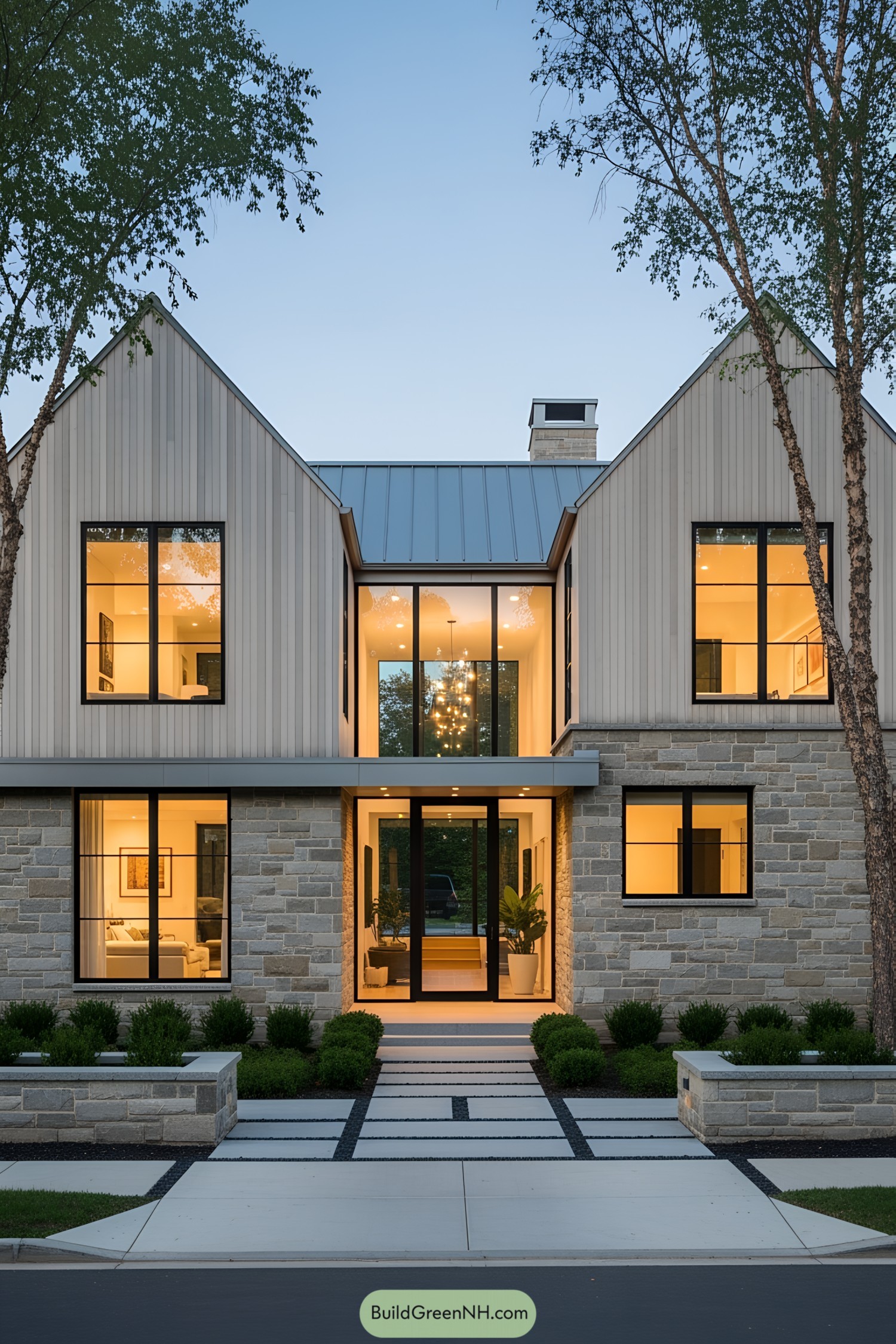 Modern Scandinavian farmhouse with large windows and stone facade