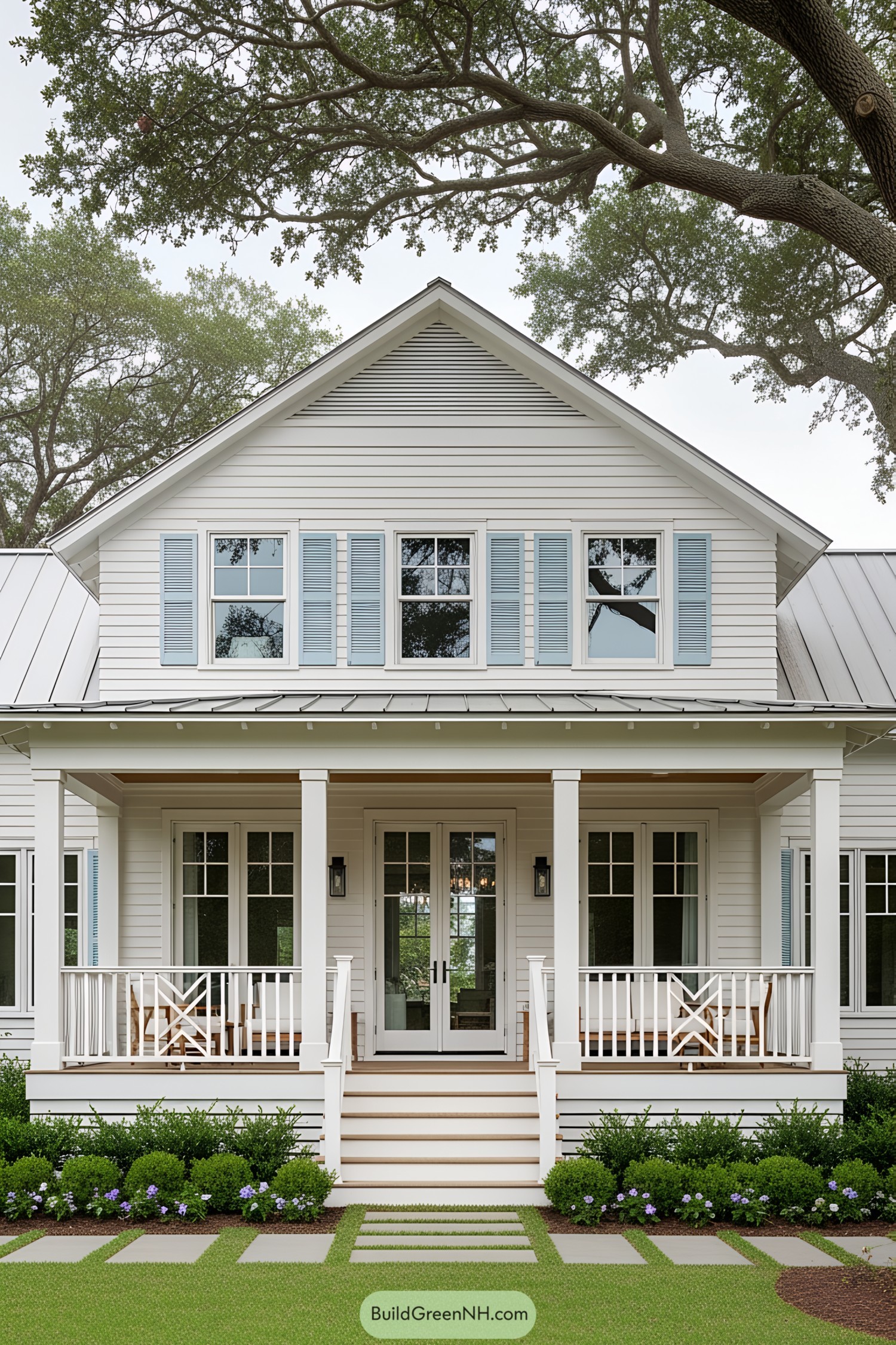 White bungalow with blue shutters and a front porch