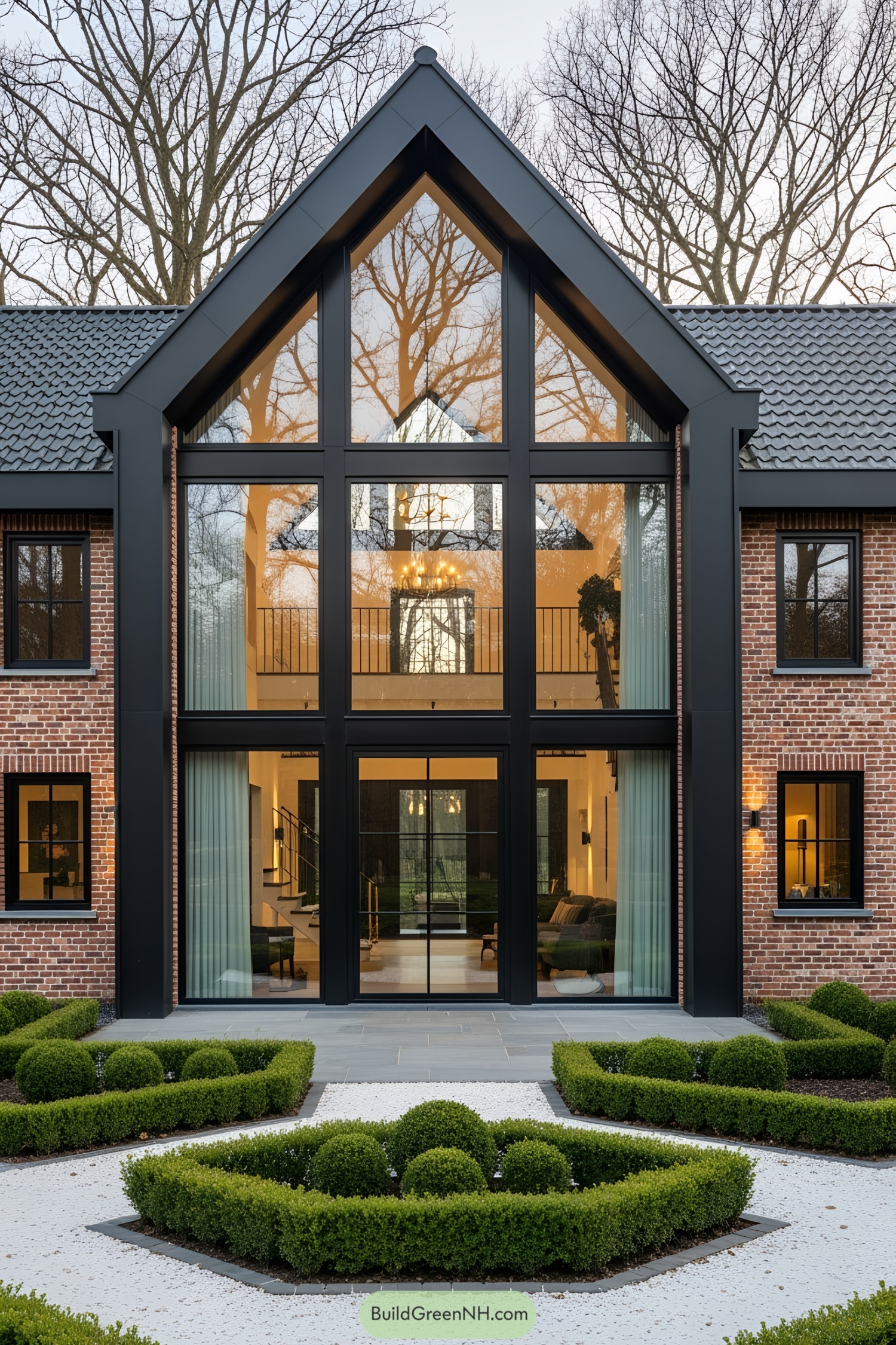 Modern house with large glass facade and brick exterior