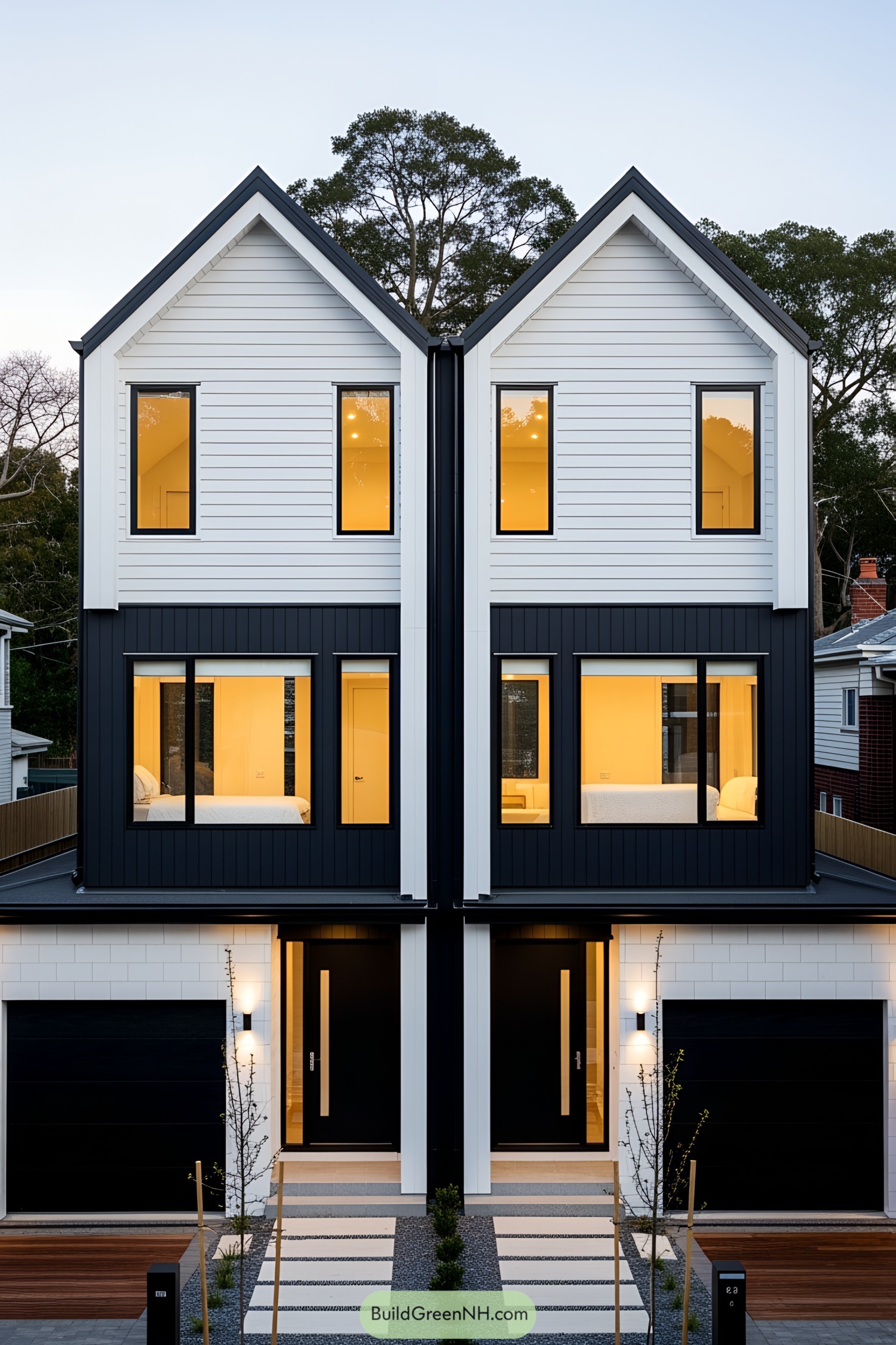 Contemporary duplex with contrasting colors and lit interiors