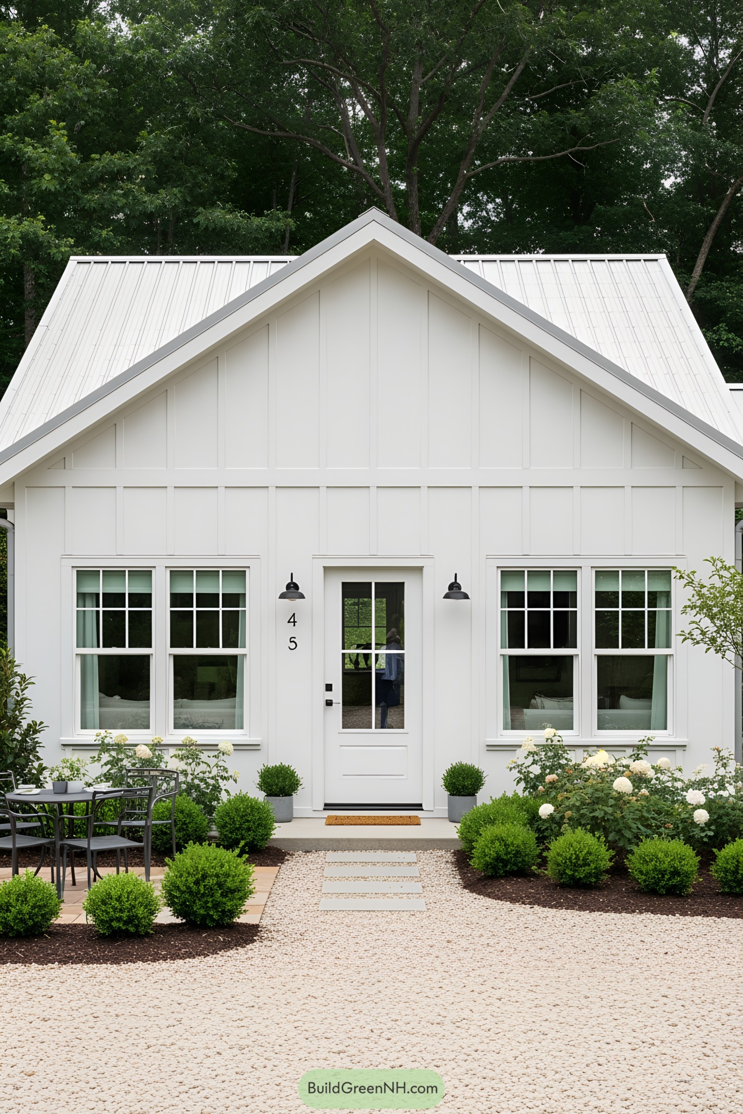 Charming white bungalow with lush greenery