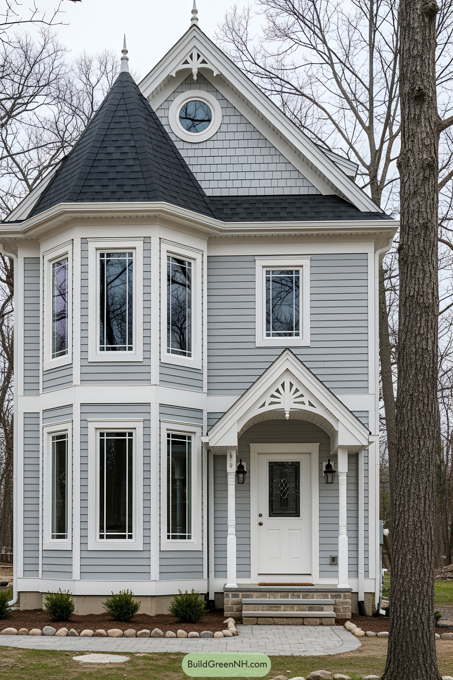Compact Victorian-style house with a charming turret and gabled roof