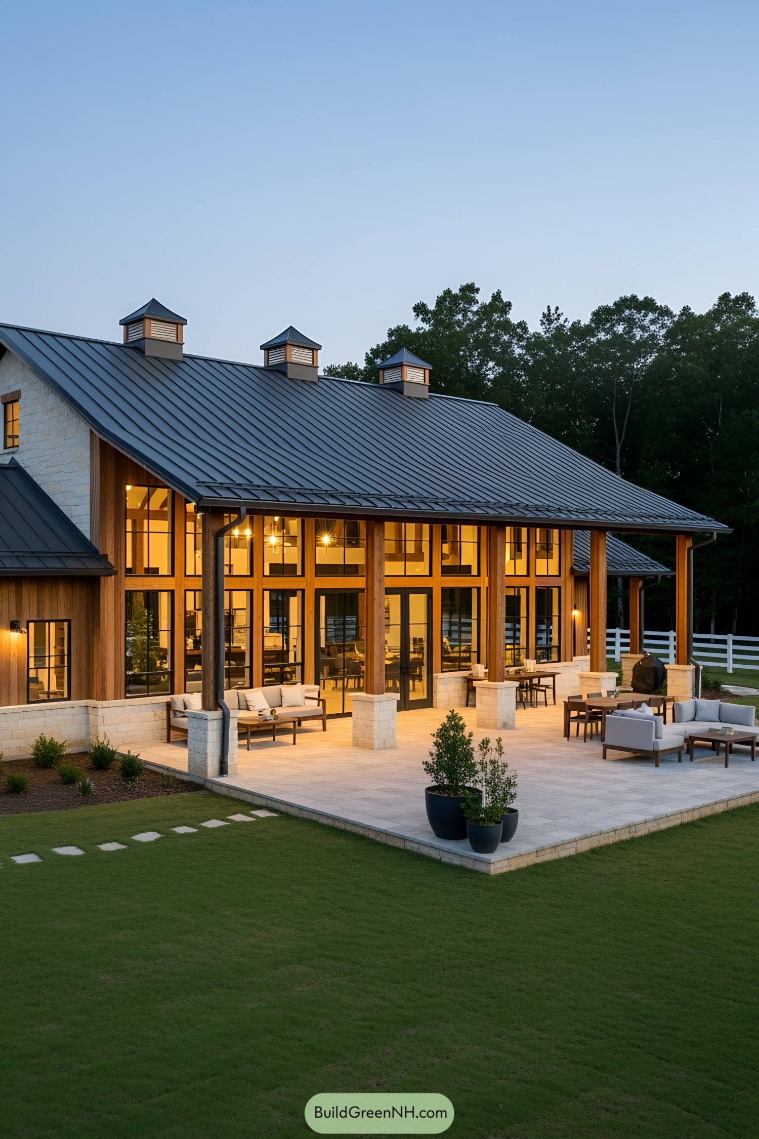 Expansive barndominium with a welcoming wraparound porch