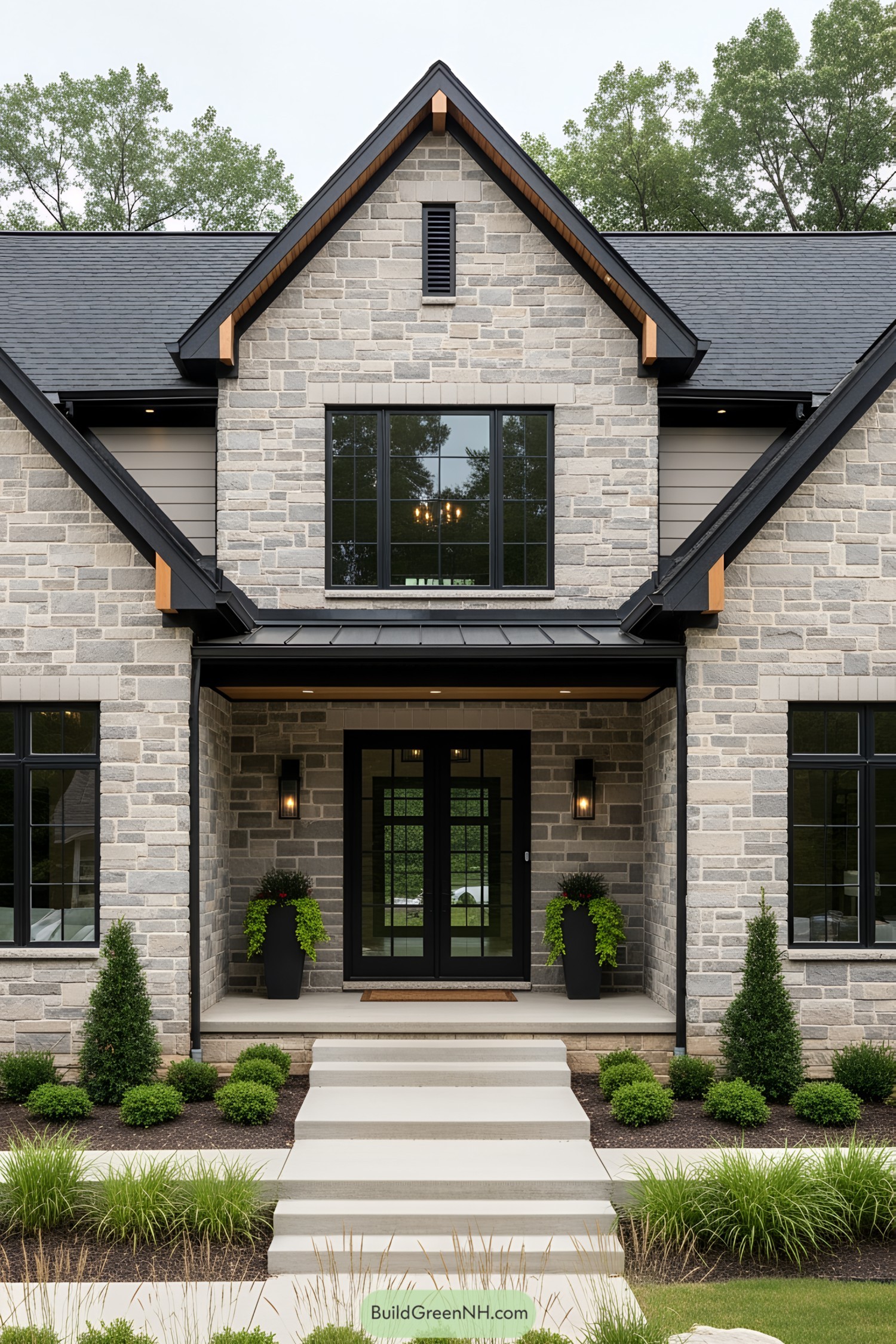 Modern brick farmhouse with large black-framed windows and lush front greenery