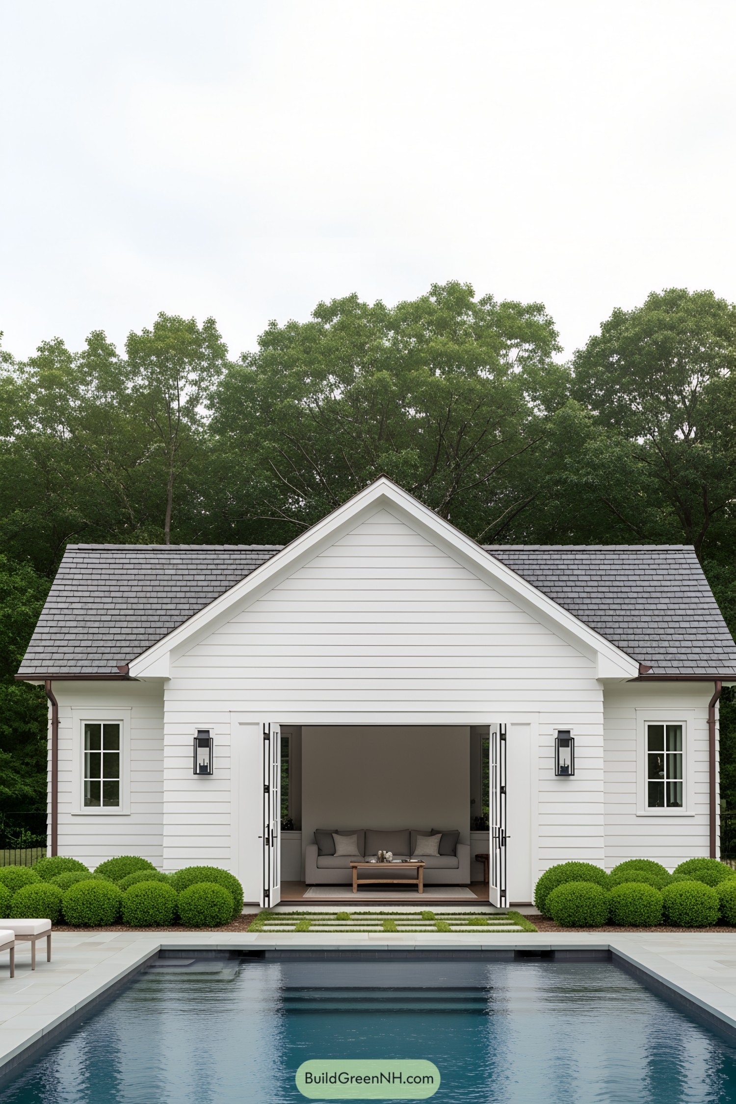 Small white pool house with open doors
