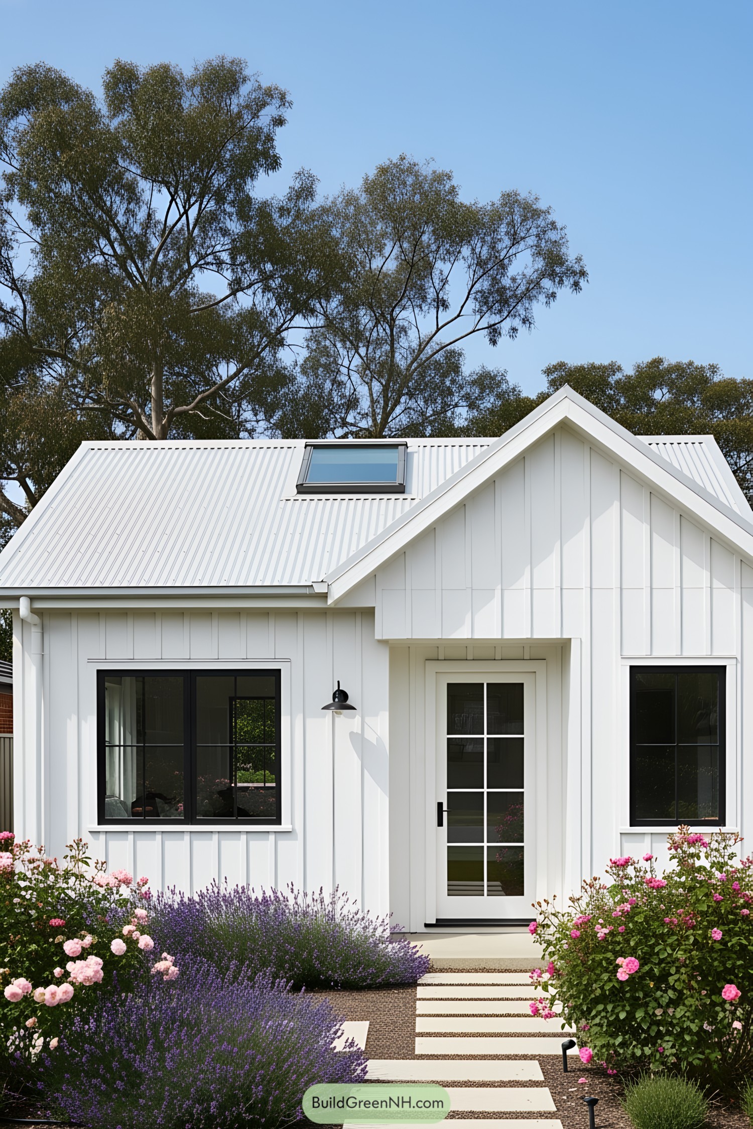 Charming white bungalow with a quaint garden