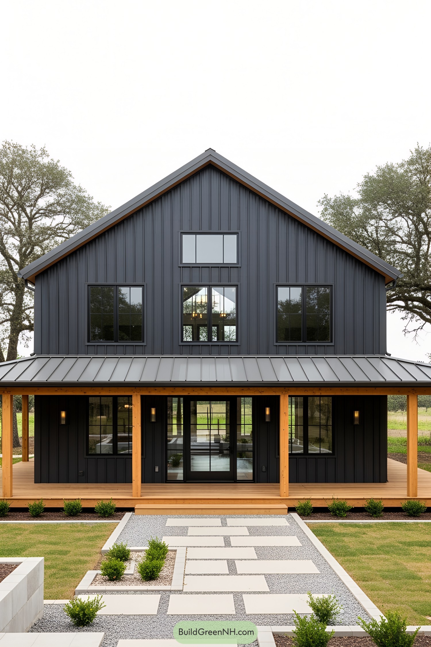 Black barn house with wood accents and modern landscaping