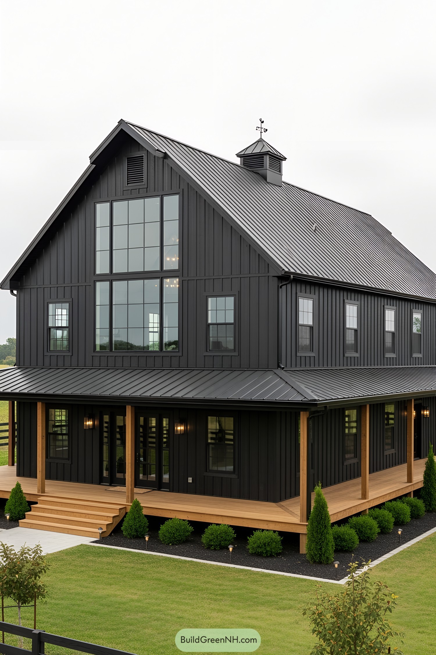 Sleek black barn house with large windows