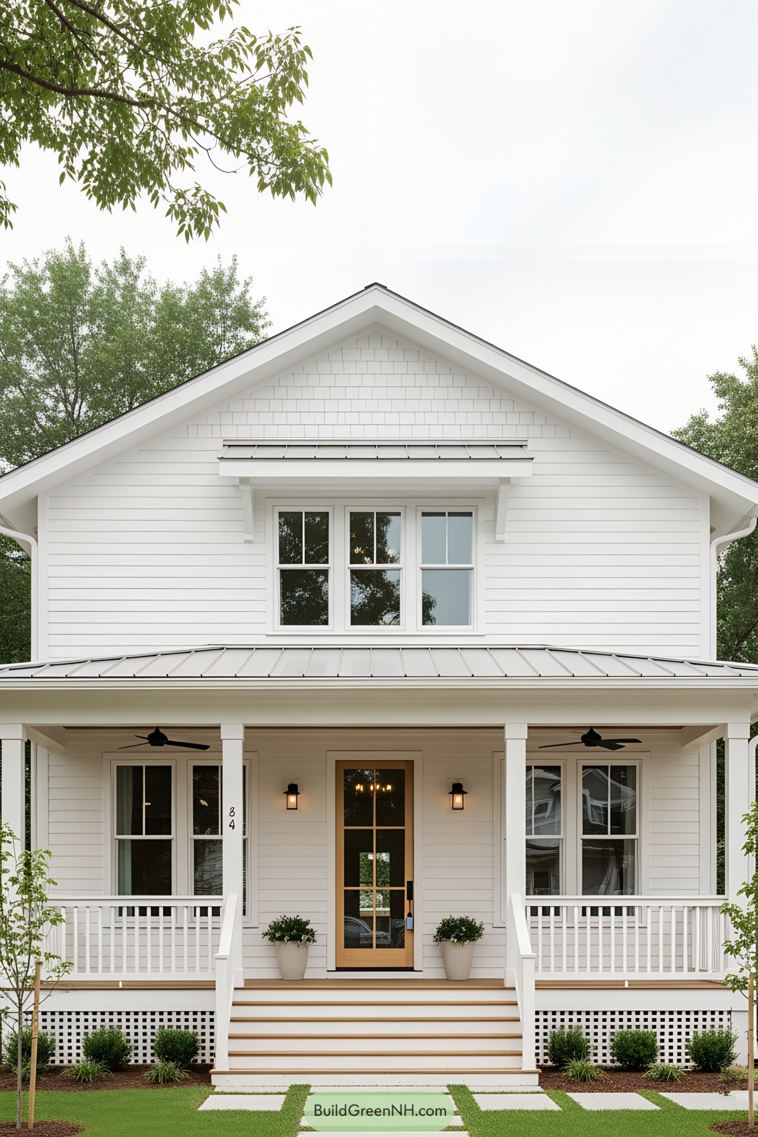 White bungalow with a cozy porch and charming simplicity