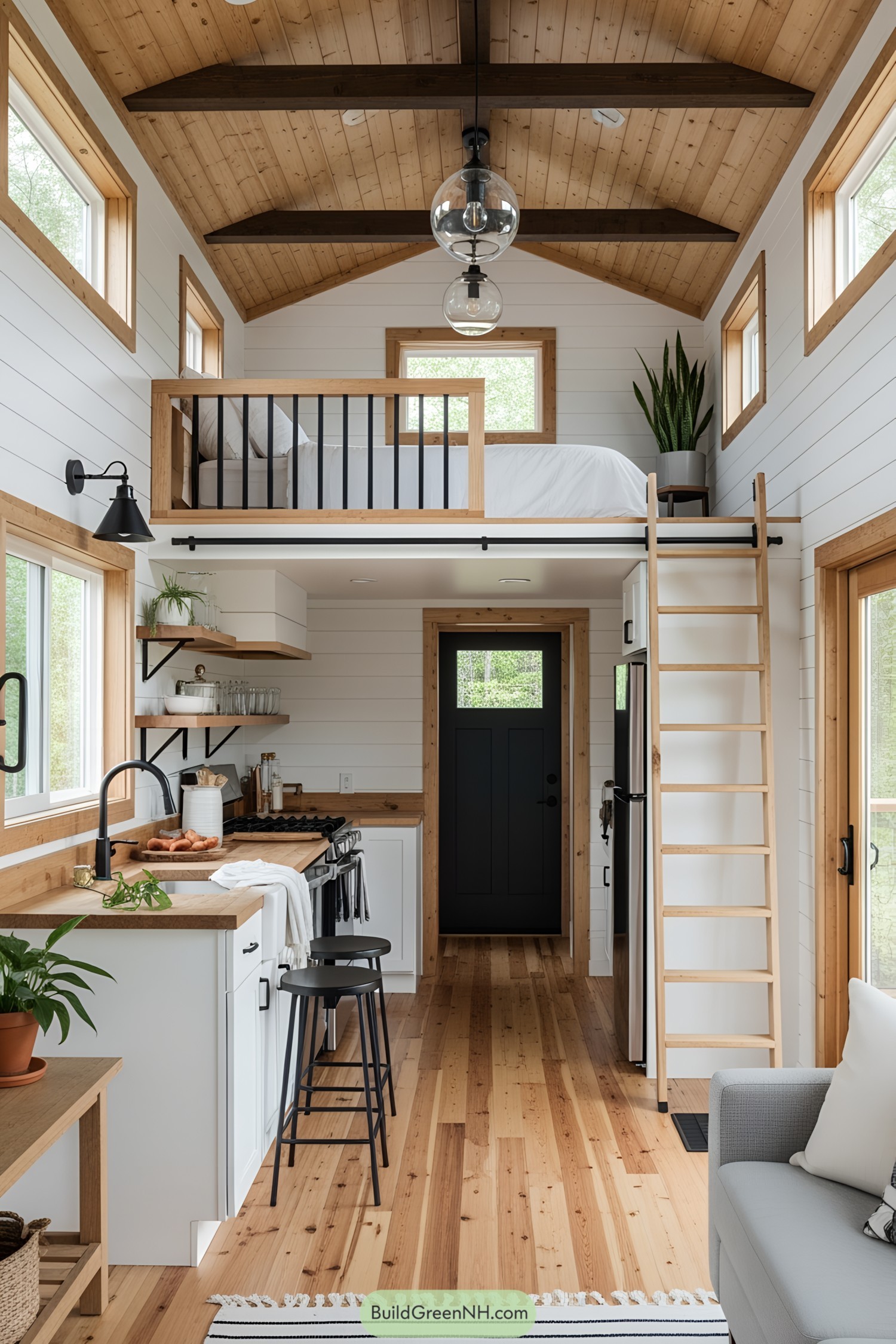 Interior of a cozy lofted tiny house with wooden accents