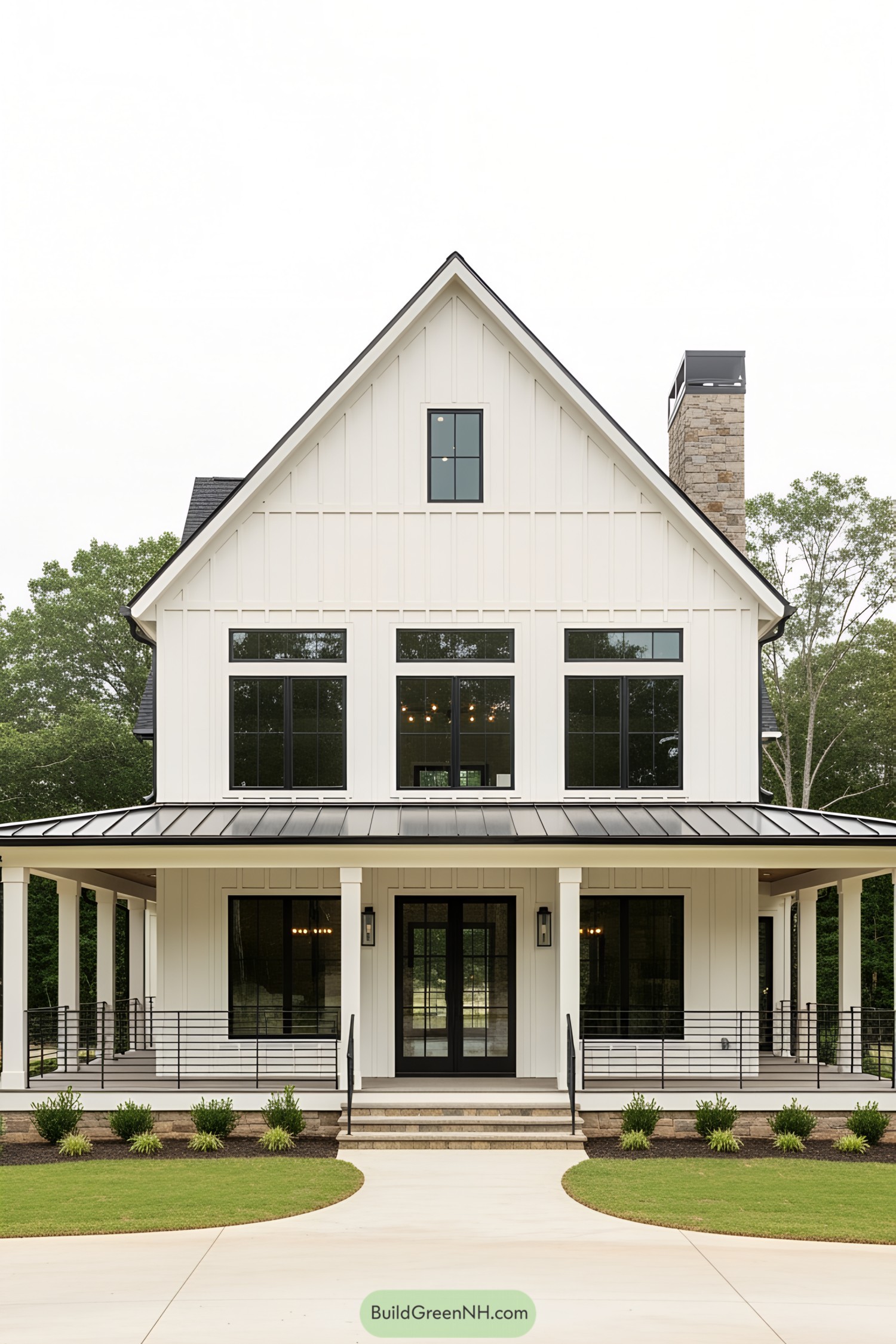 Sleek barn-style home with expansive porch