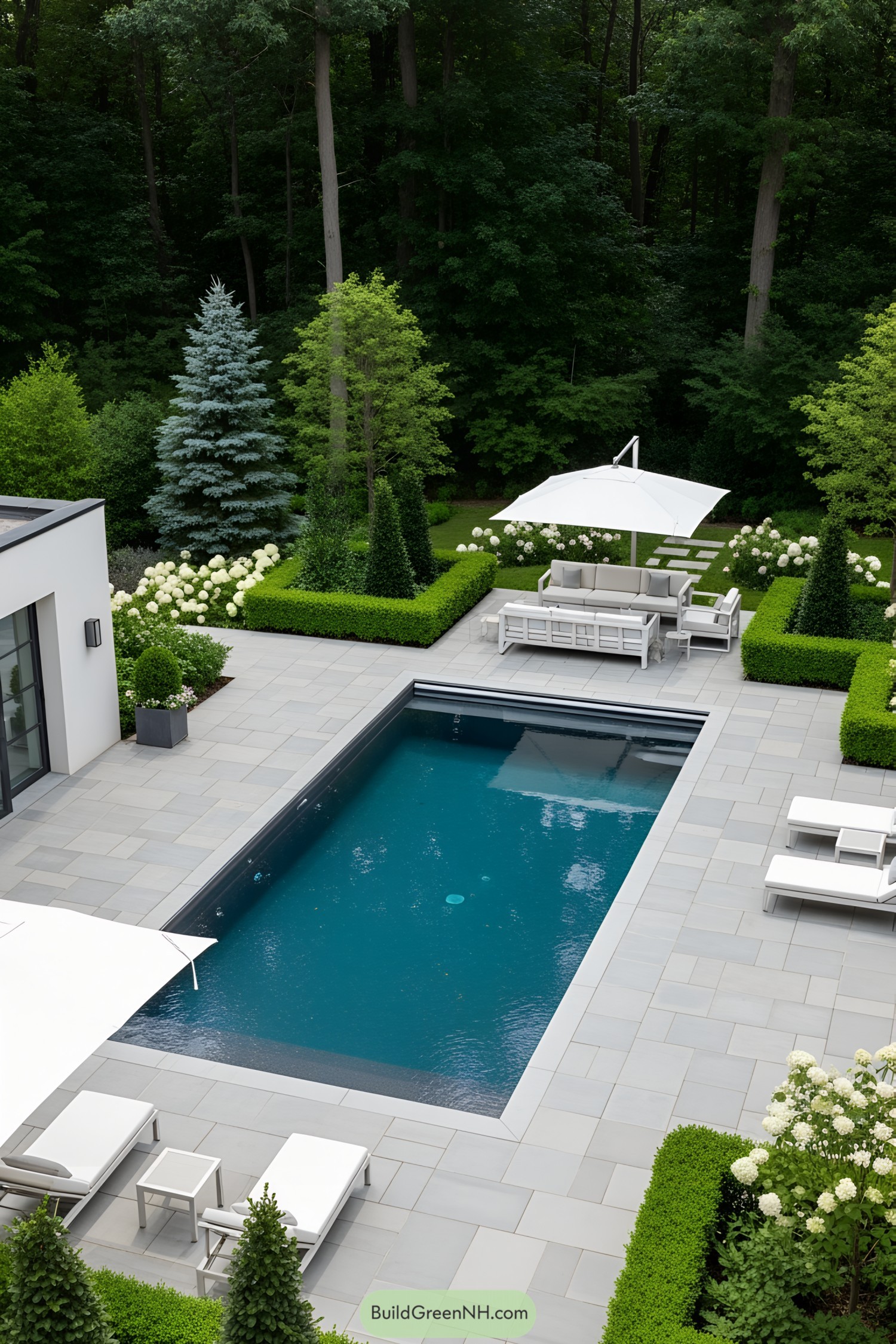 Modern pool house with lush greenery