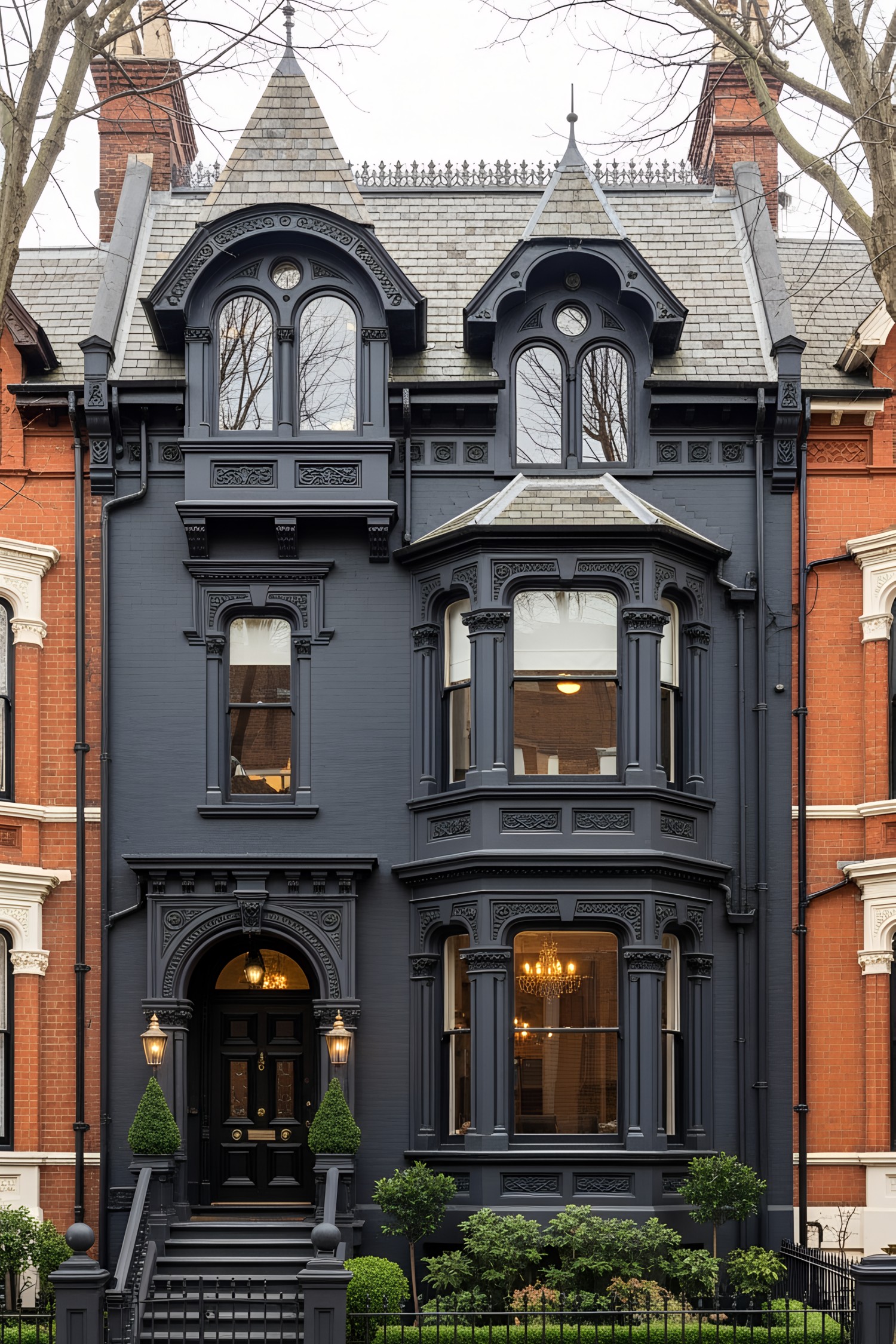 Black Victorian house with ornate detailing and large bay windows