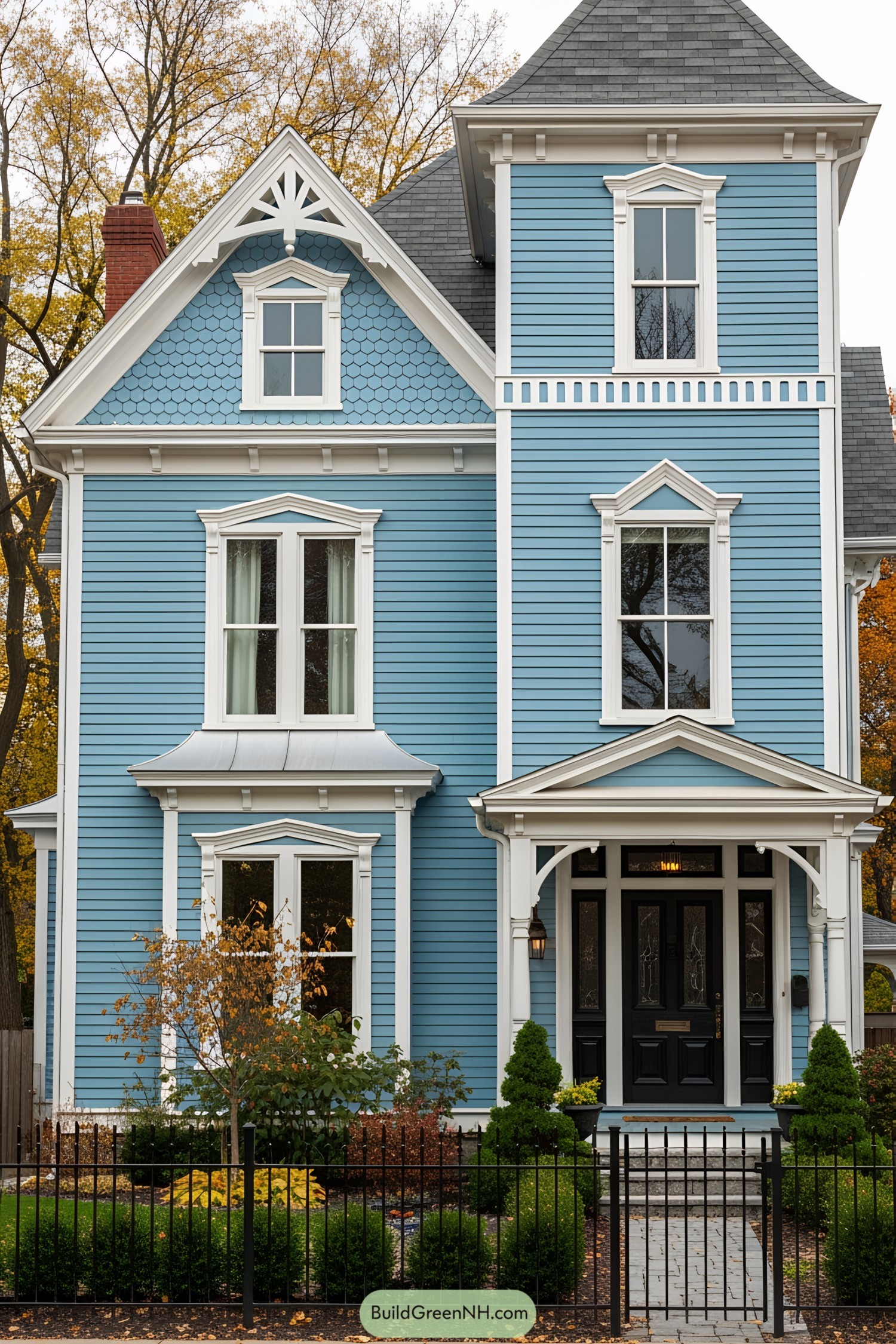 Blue Victorian house with detailed trim