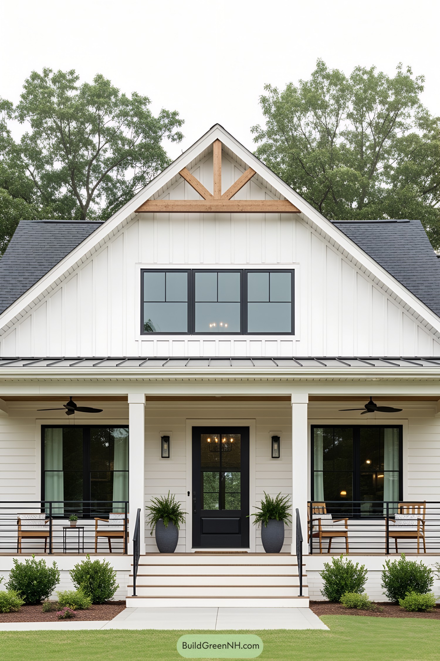 White farmhouse with black accents and cozy porch