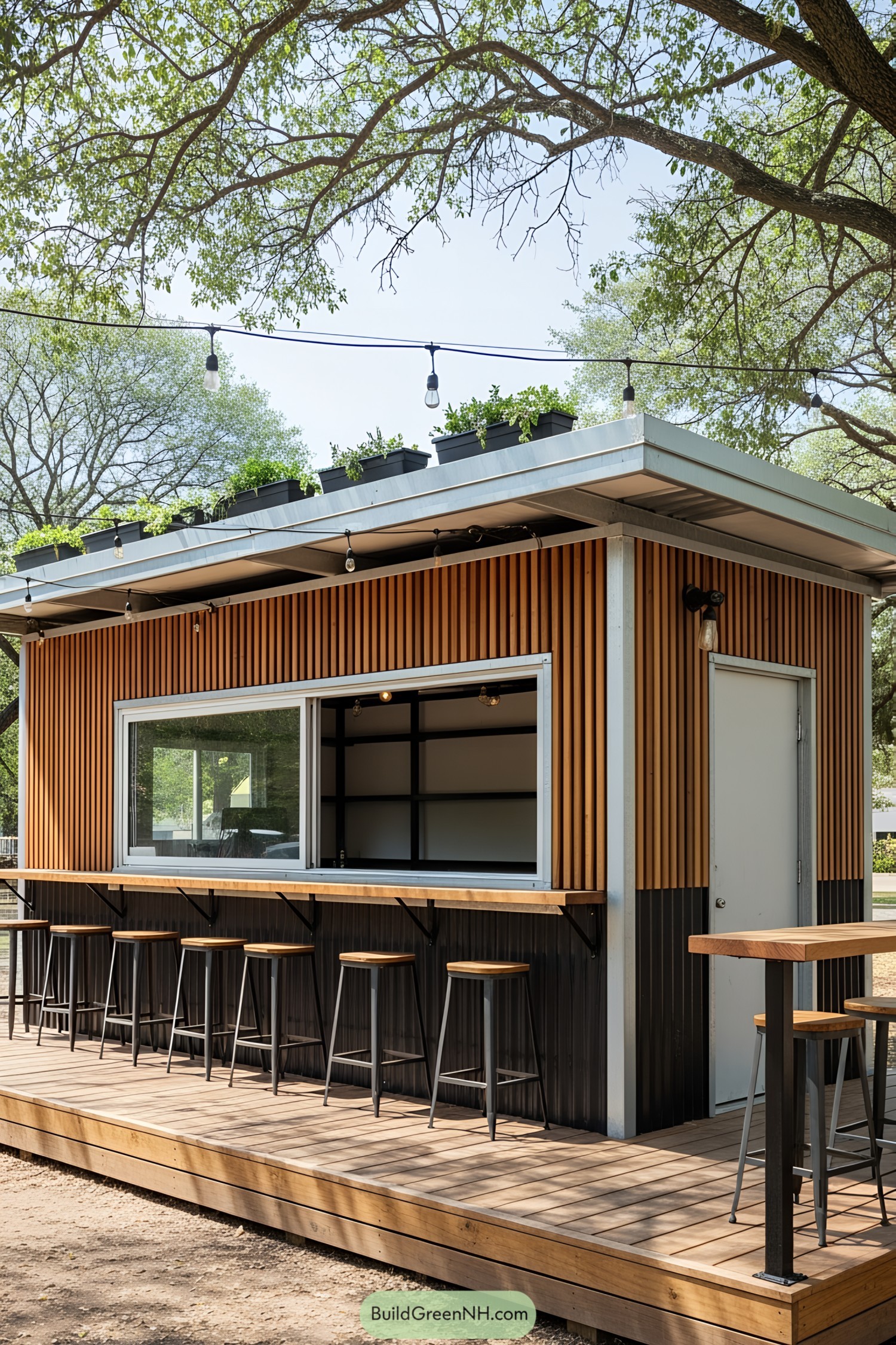 Compact bar made from a shipping container with seating and a rooftop garden