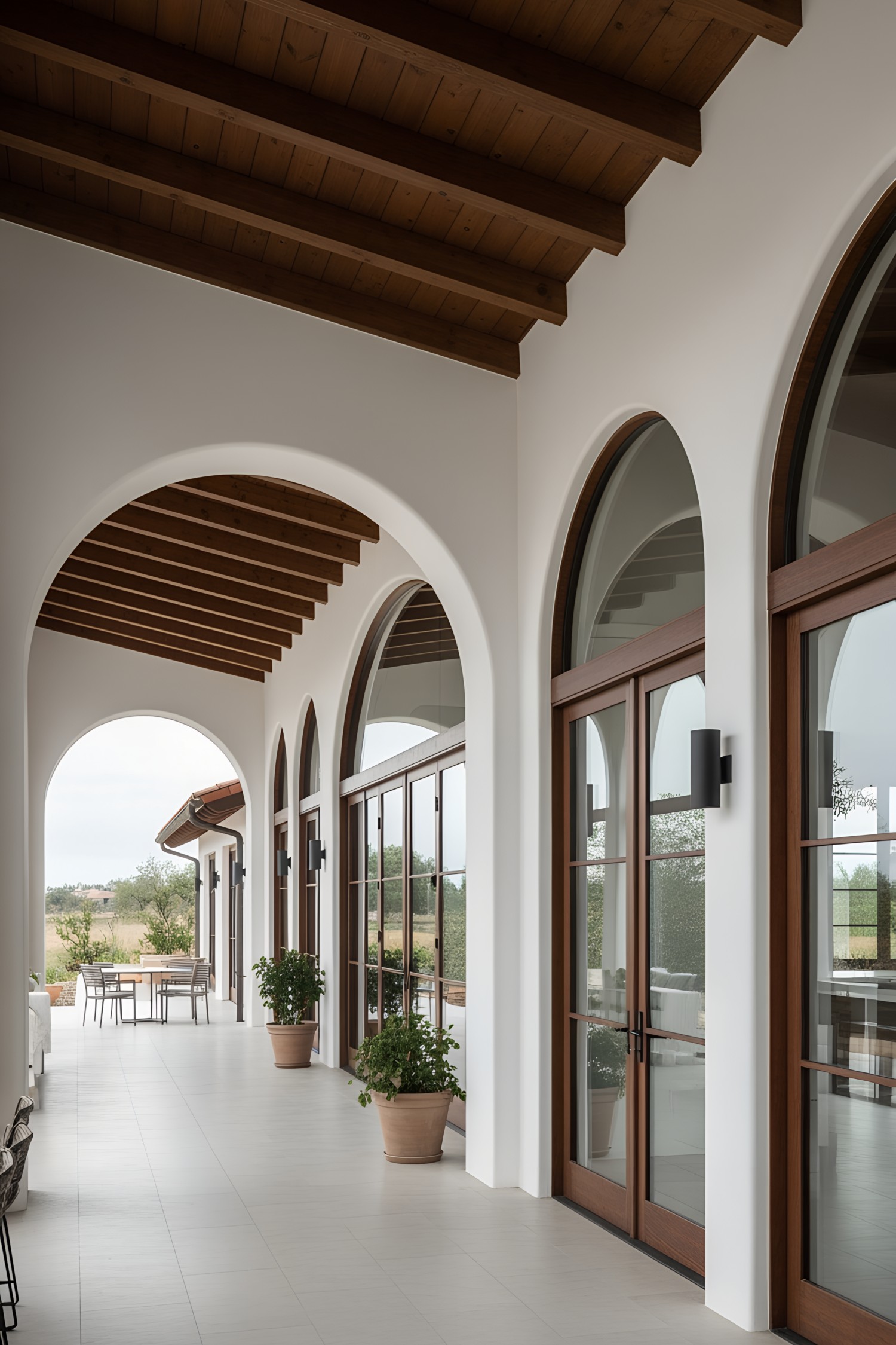 Elegant arched porch of a modern Spanish farmhouse
