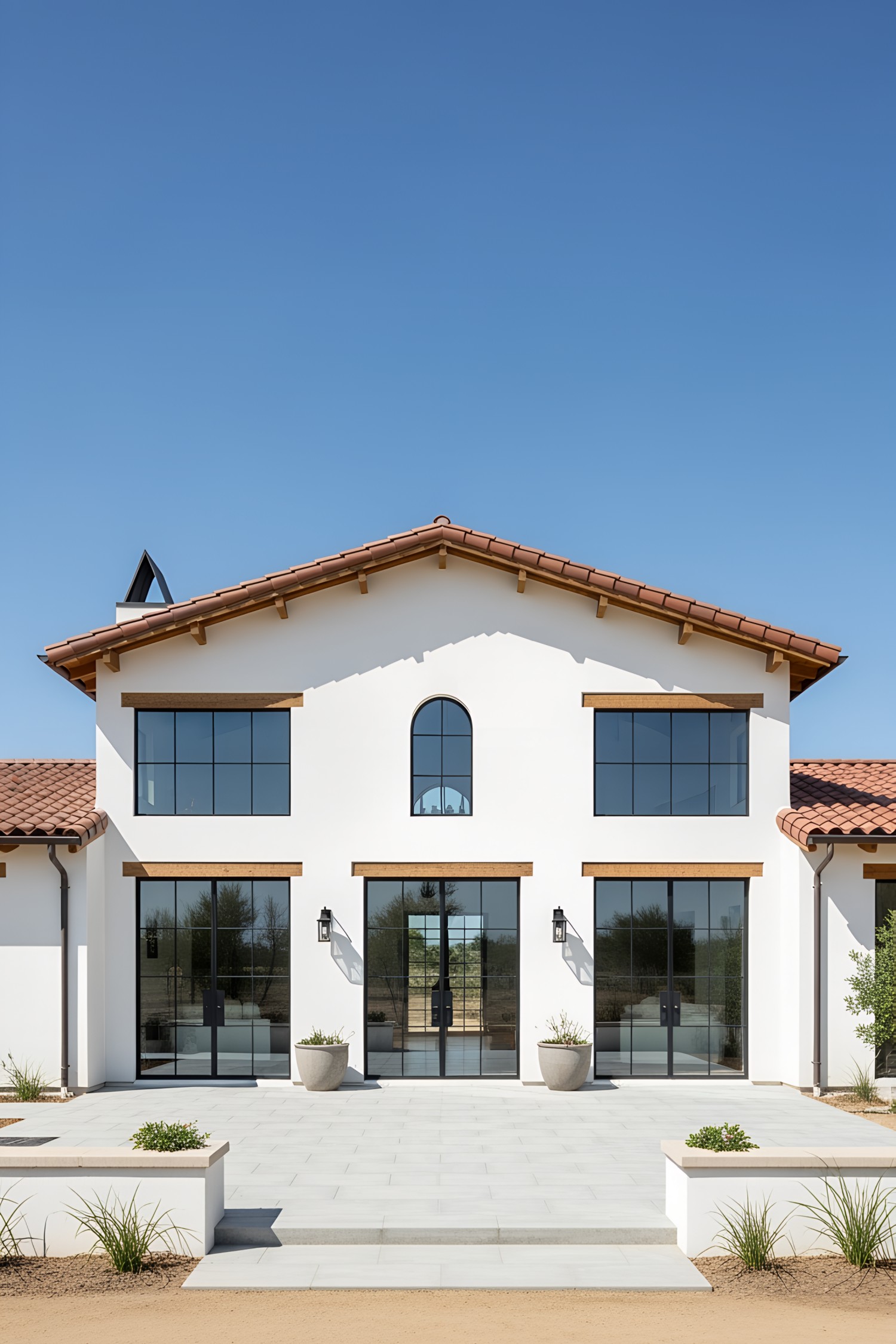 Contemporary farmhouse with white walls and terracotta roof