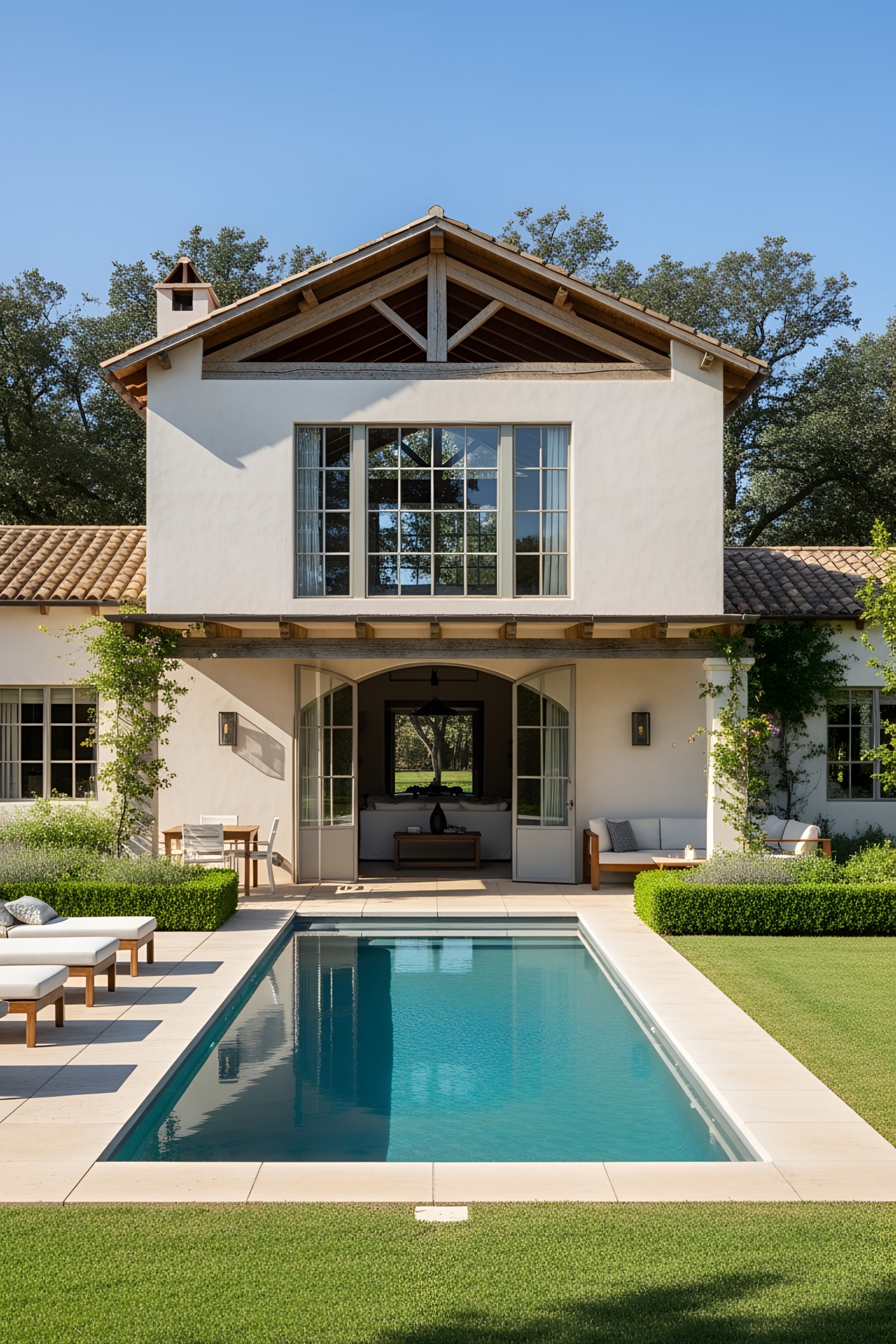 Contemporary Spanish farmhouse with a poolside view