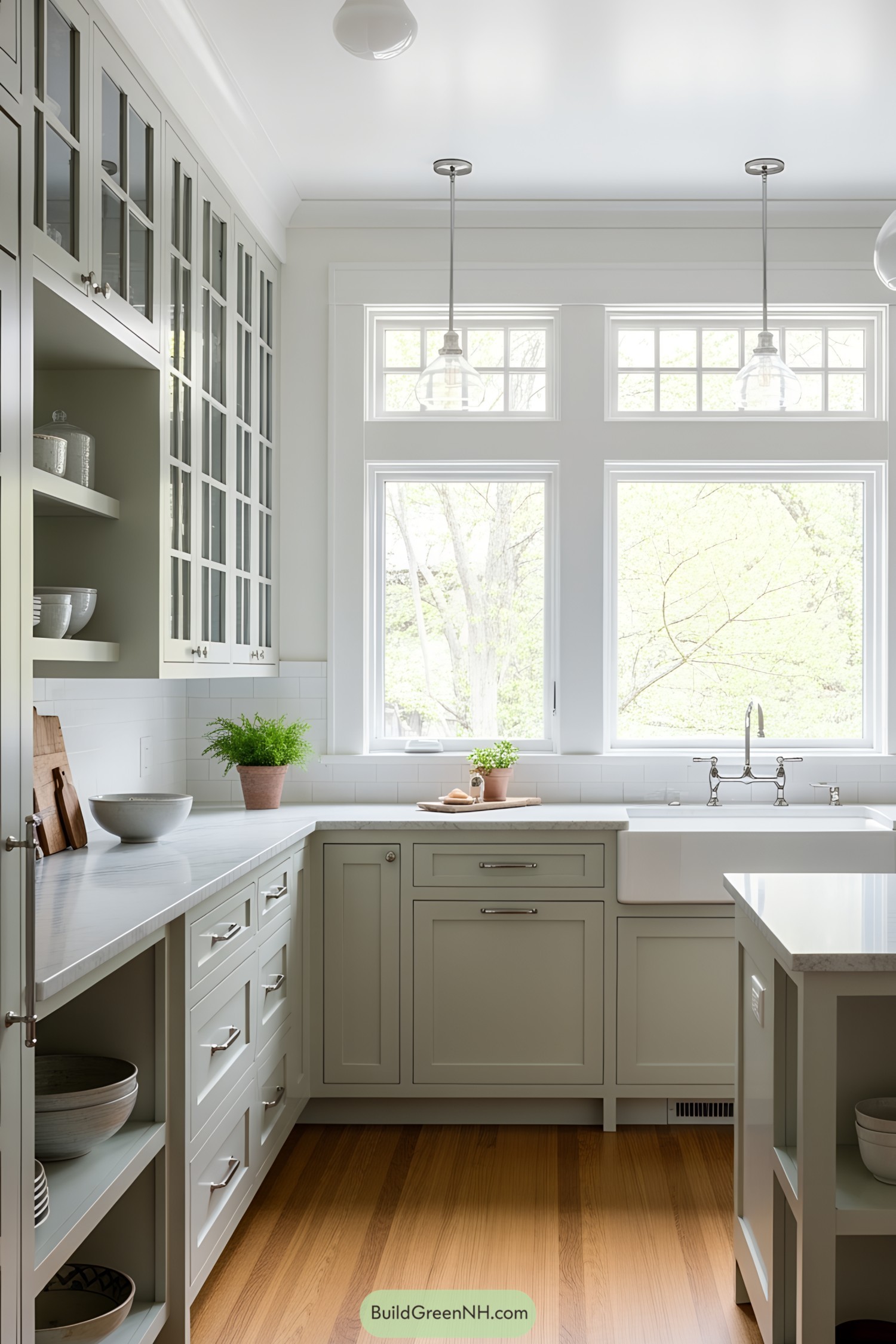 Bright craftsman kitchen with green cabinetry