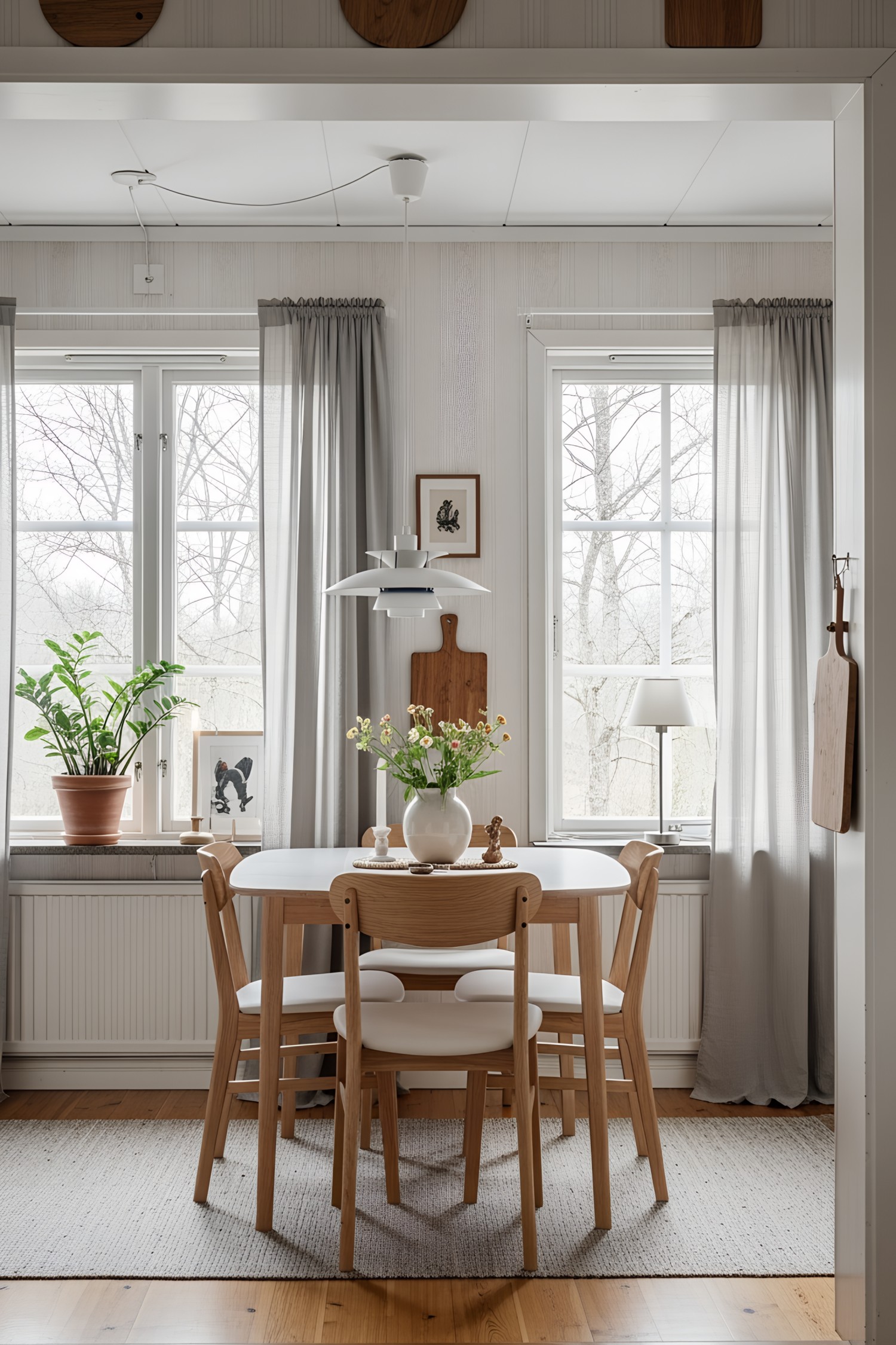 Light-filled dining area with wooden furniture