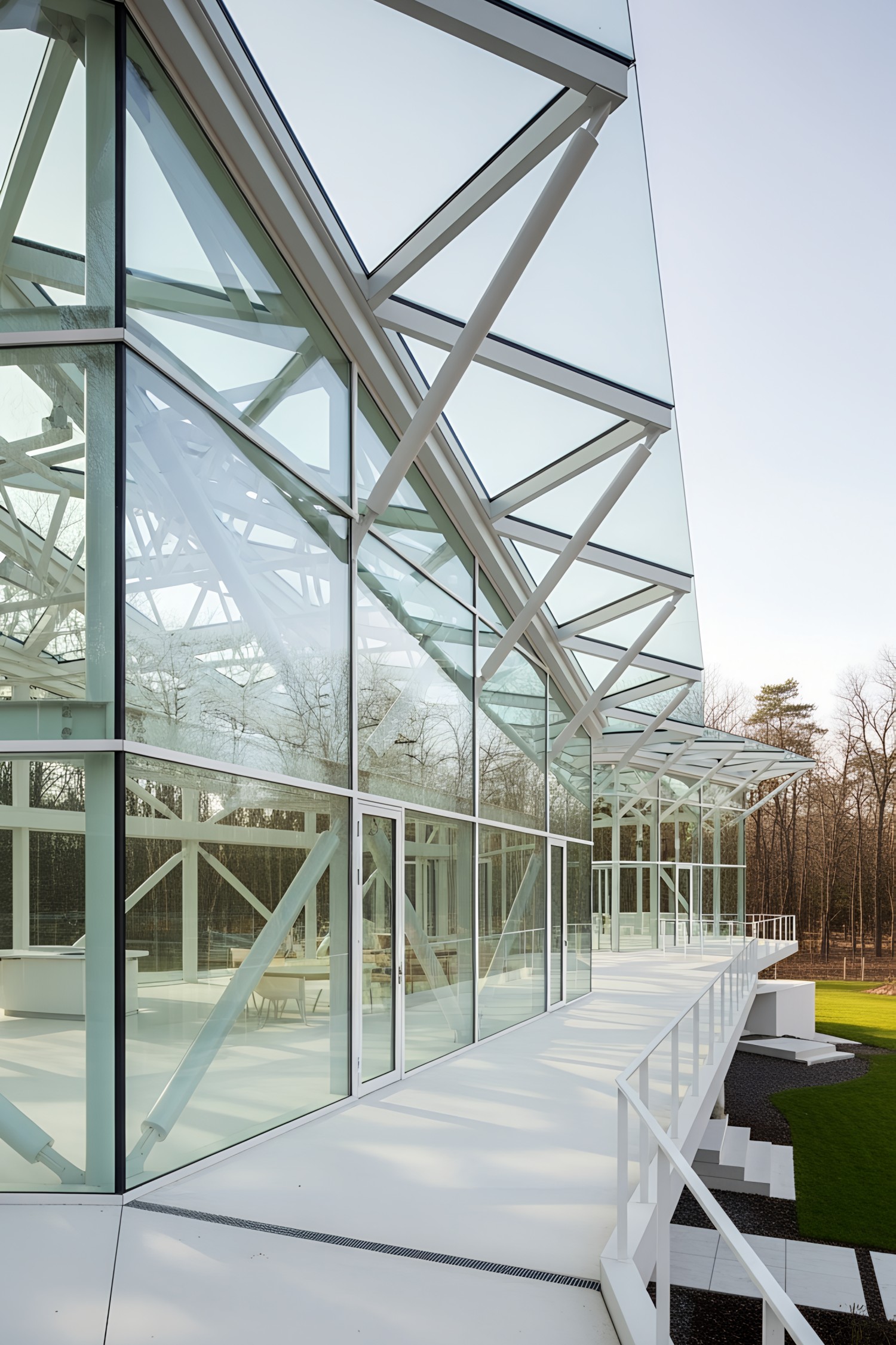 Modern glass pavilion with surrounding nature