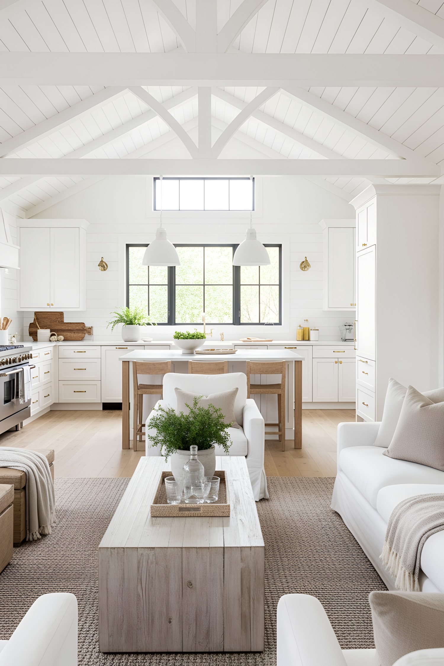 Bright and airy modern beach house living room with white and natural wood elements