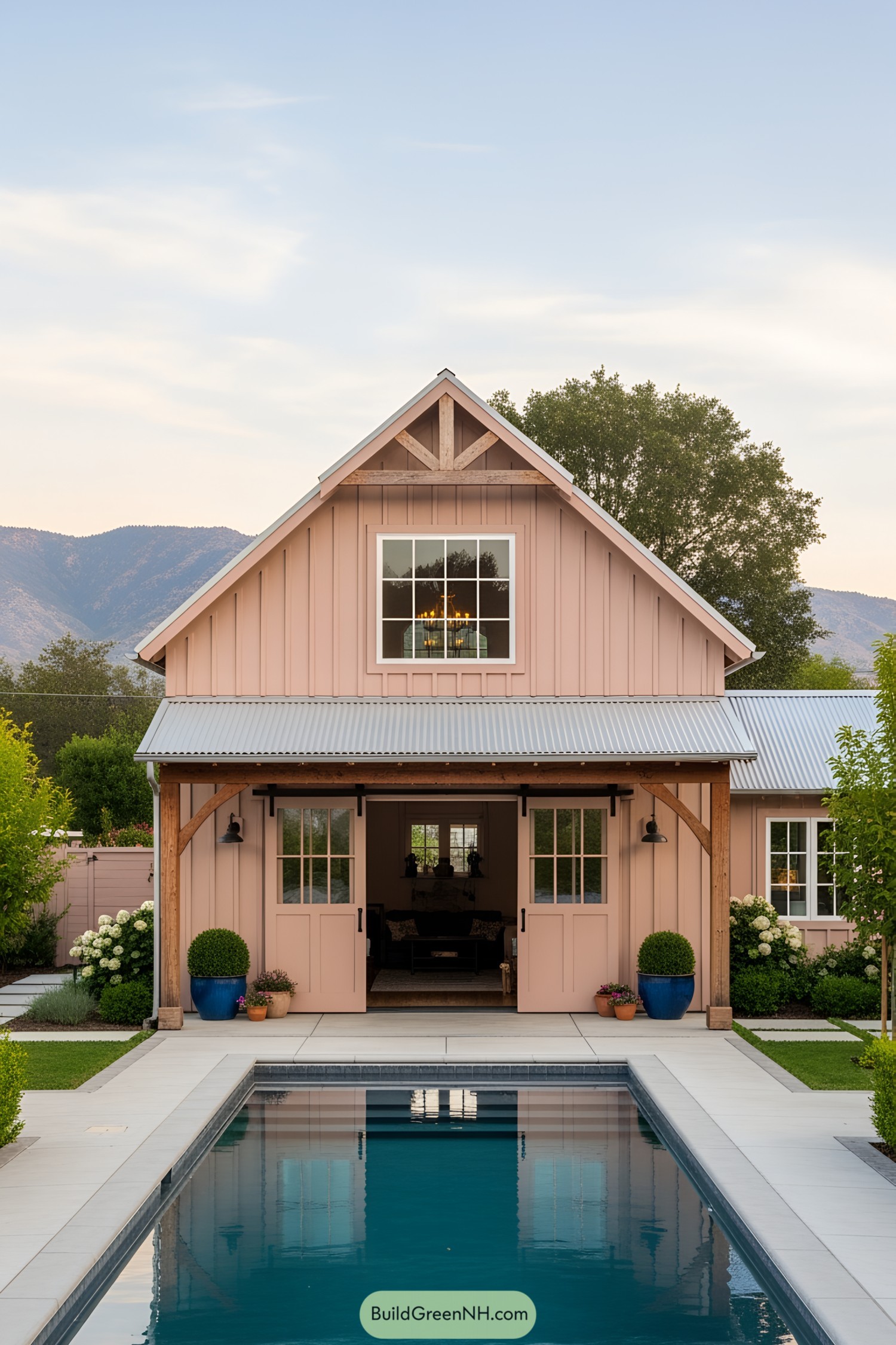 Charming pool house with rustic doors and lush backdrop