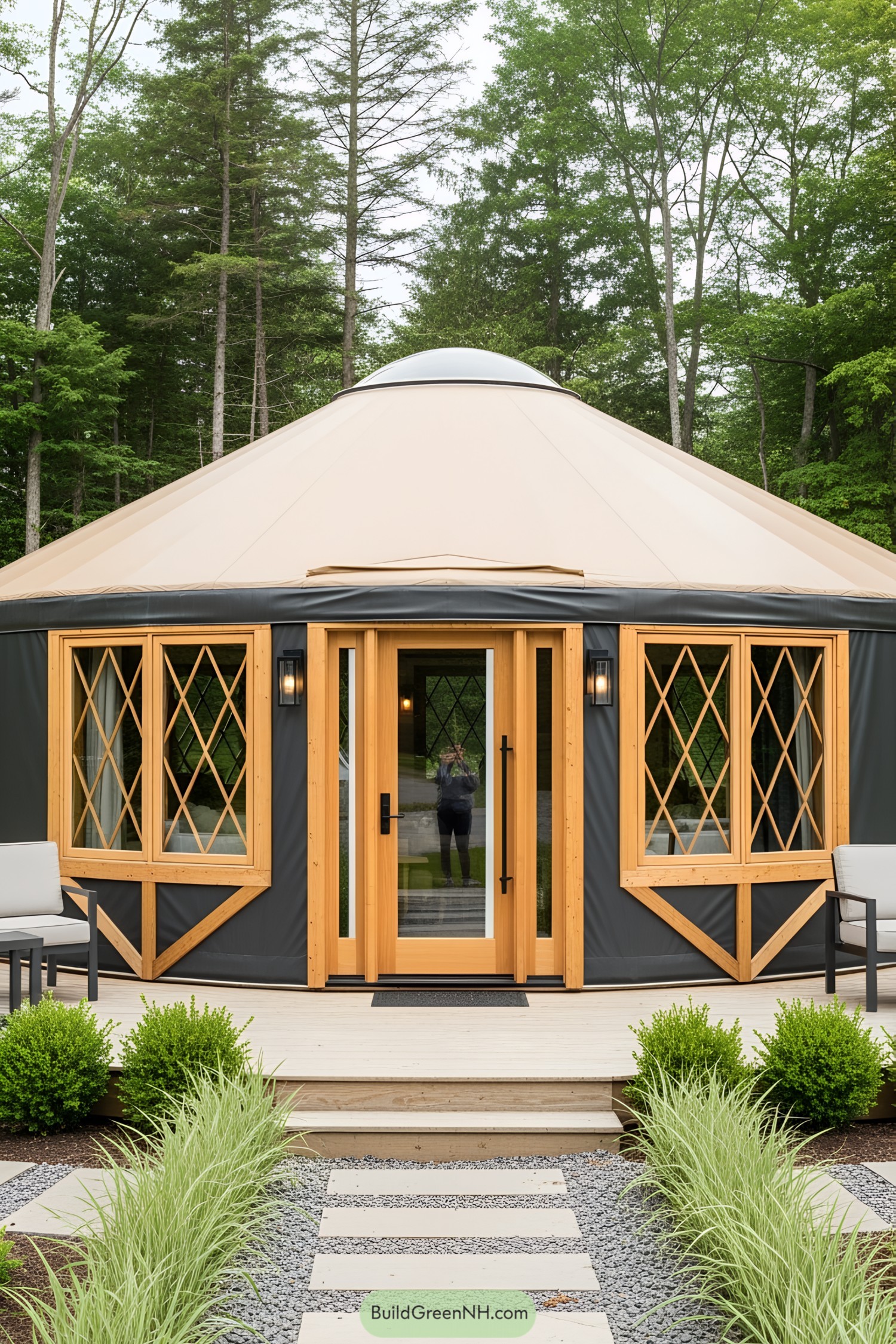 Wooden yurt surrounded by lush greenery