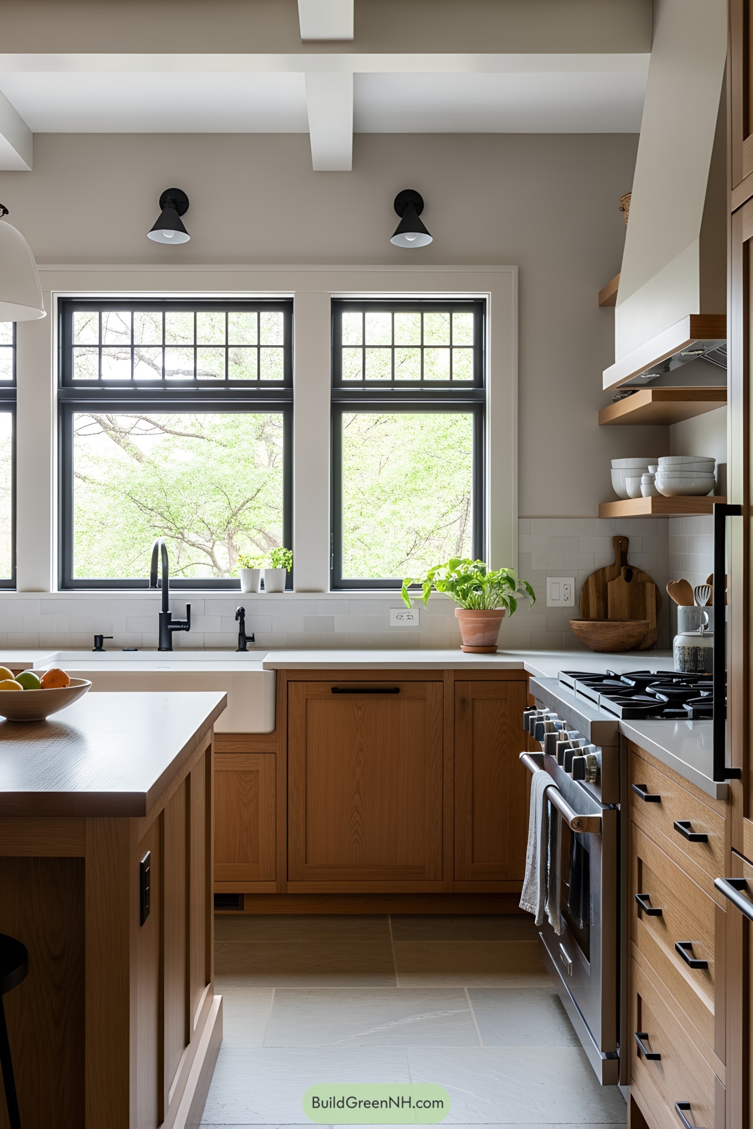 Bright kitchen with wooden cabinets and large windows