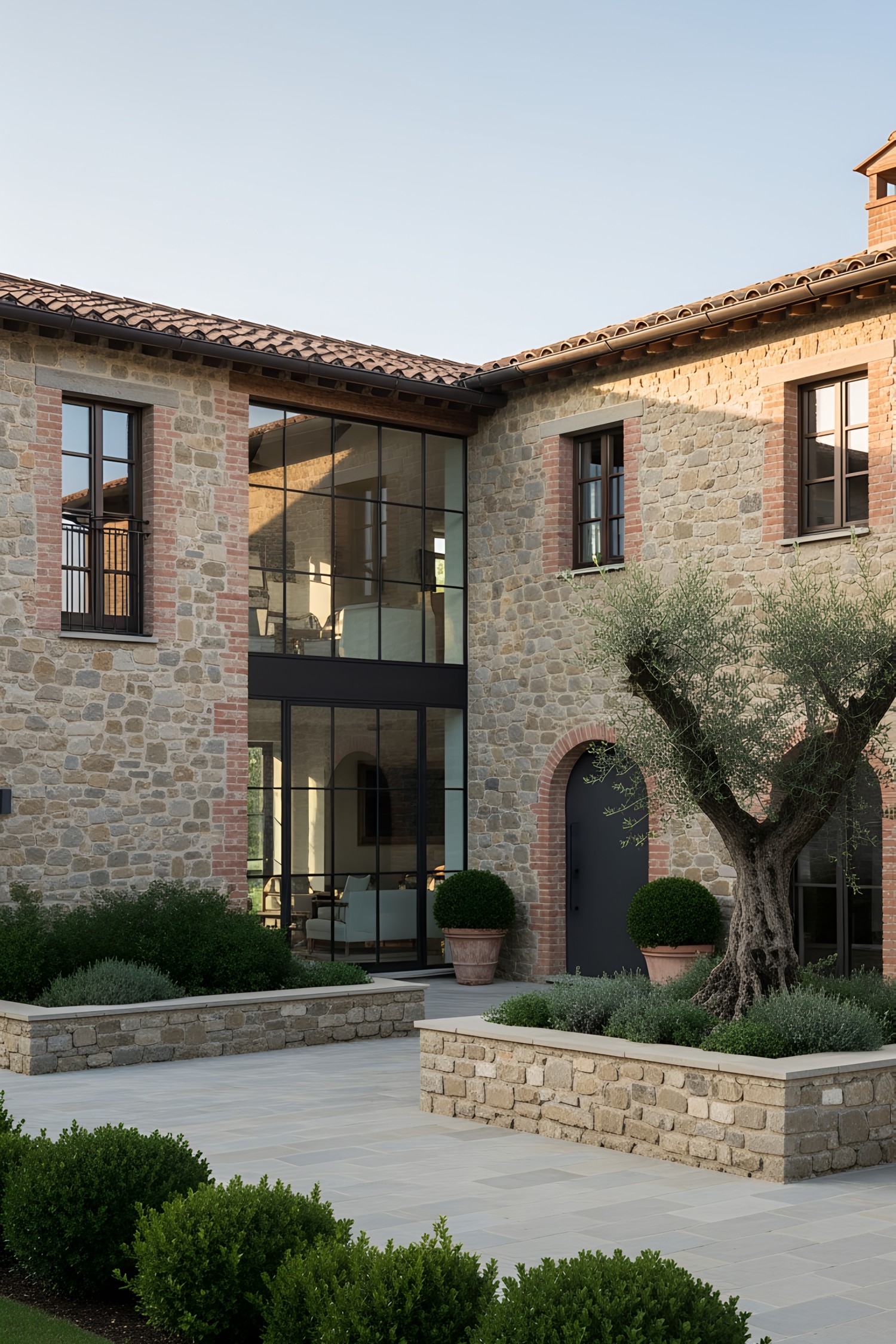 Modern Tuscan villa with stone exterior