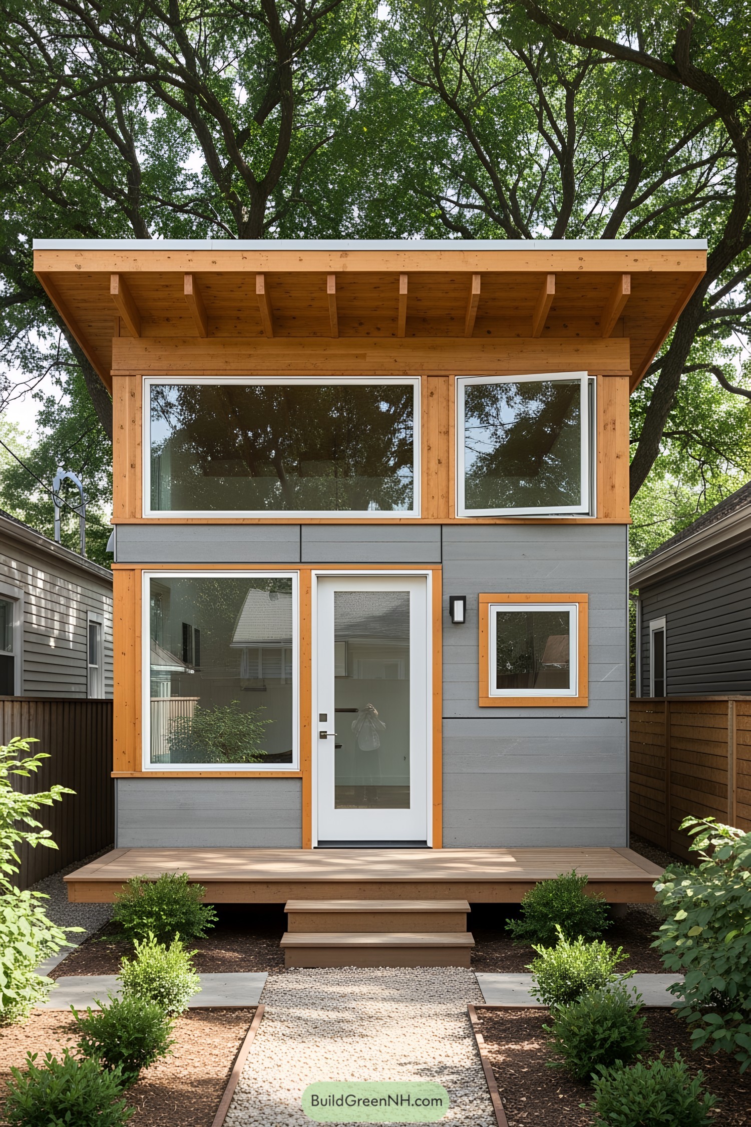 Compact structure with large windows and wood trim