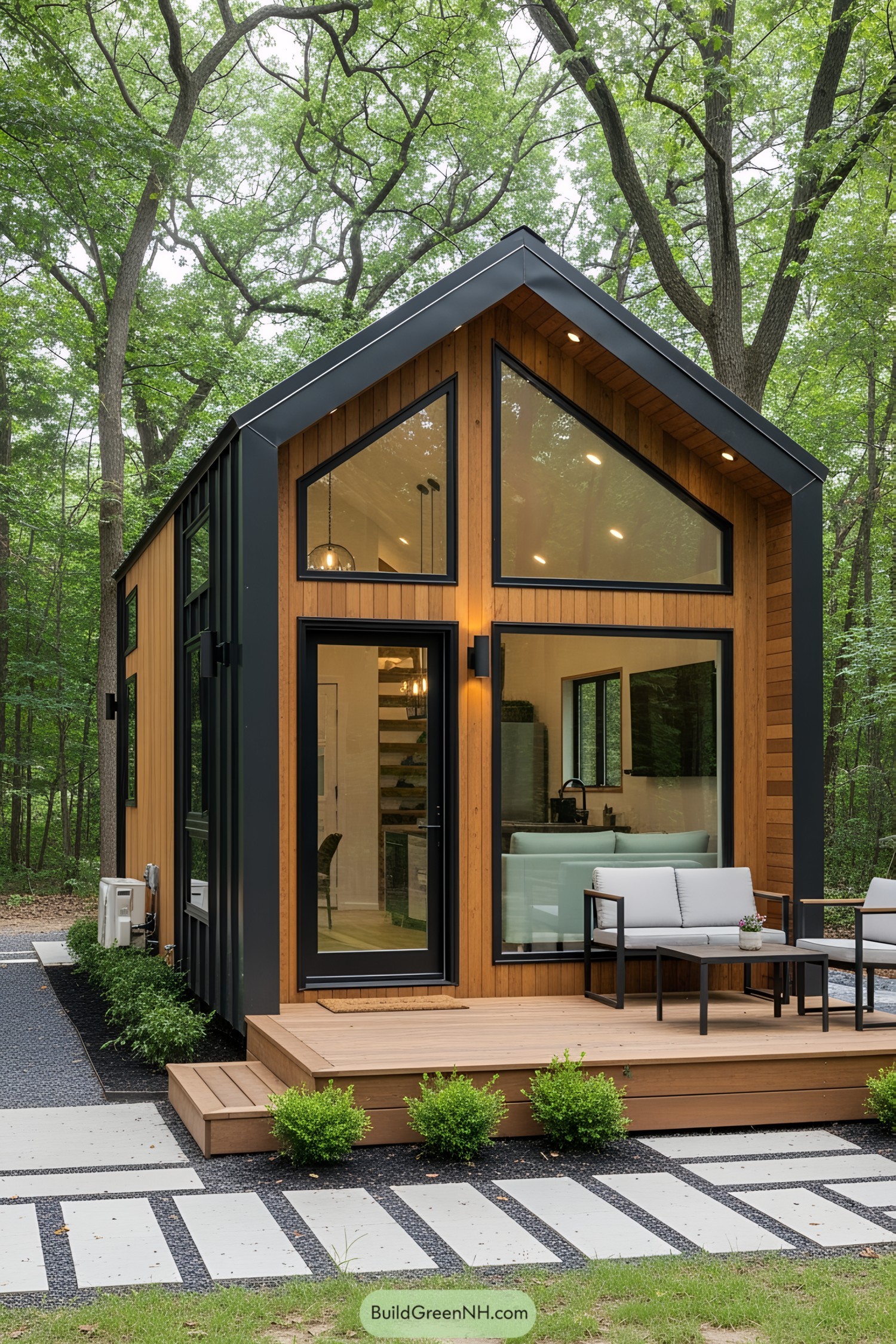 Modern tiny cottage with glass windows and wooden exterior