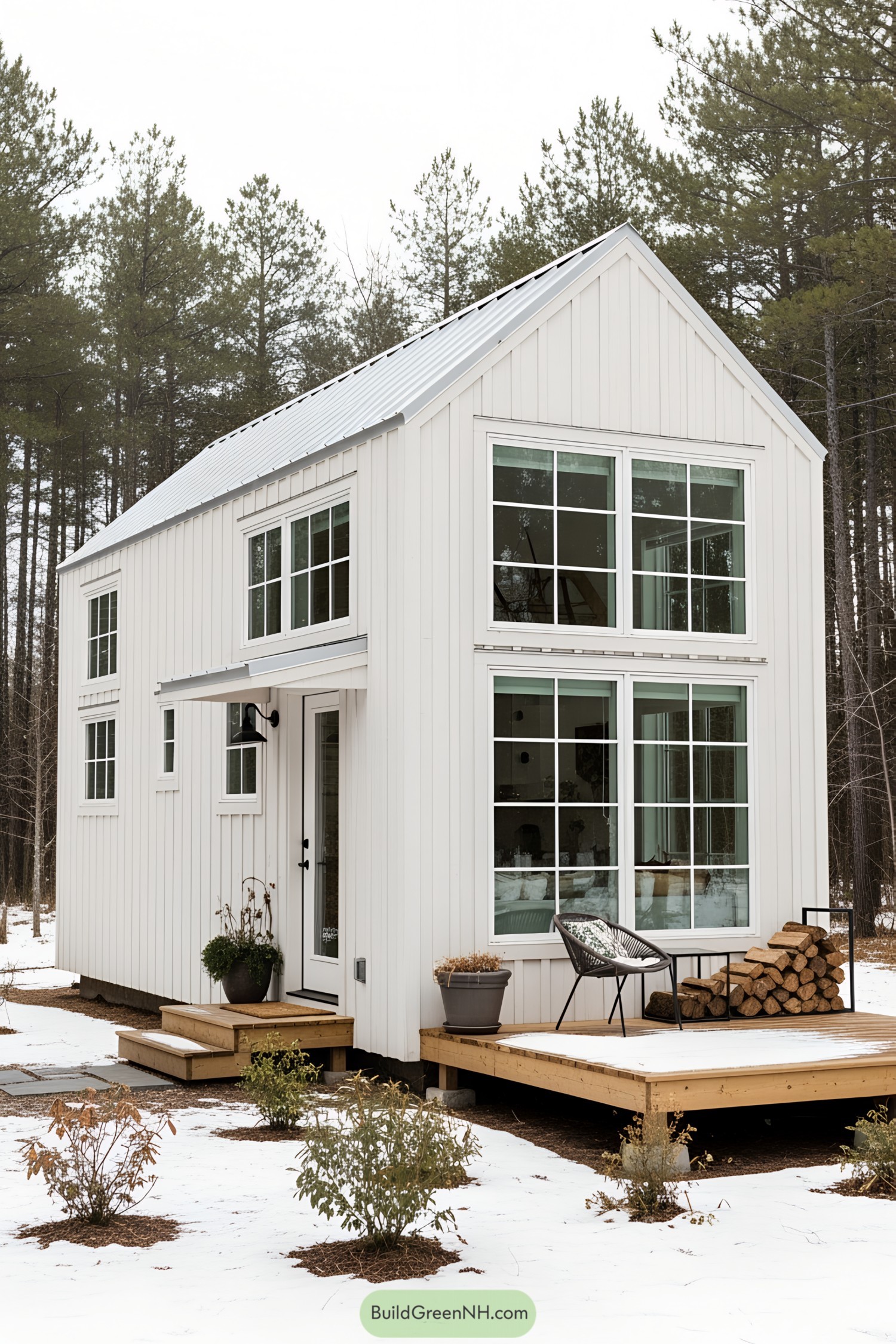 A tiny, modern cottage in a snowy forest