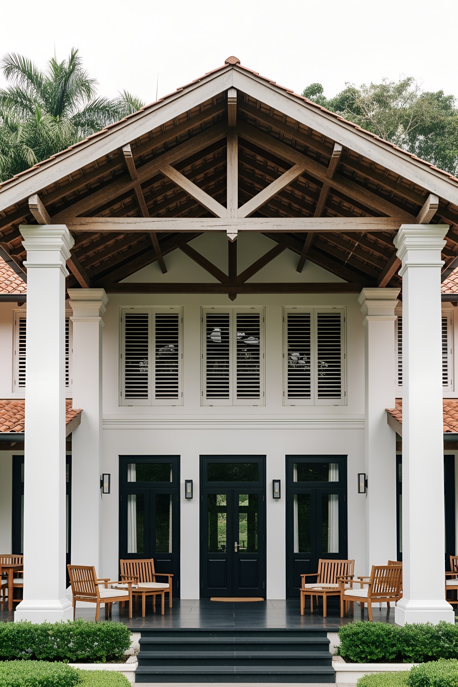 Grand colonial house with white pillars and wooden furniture