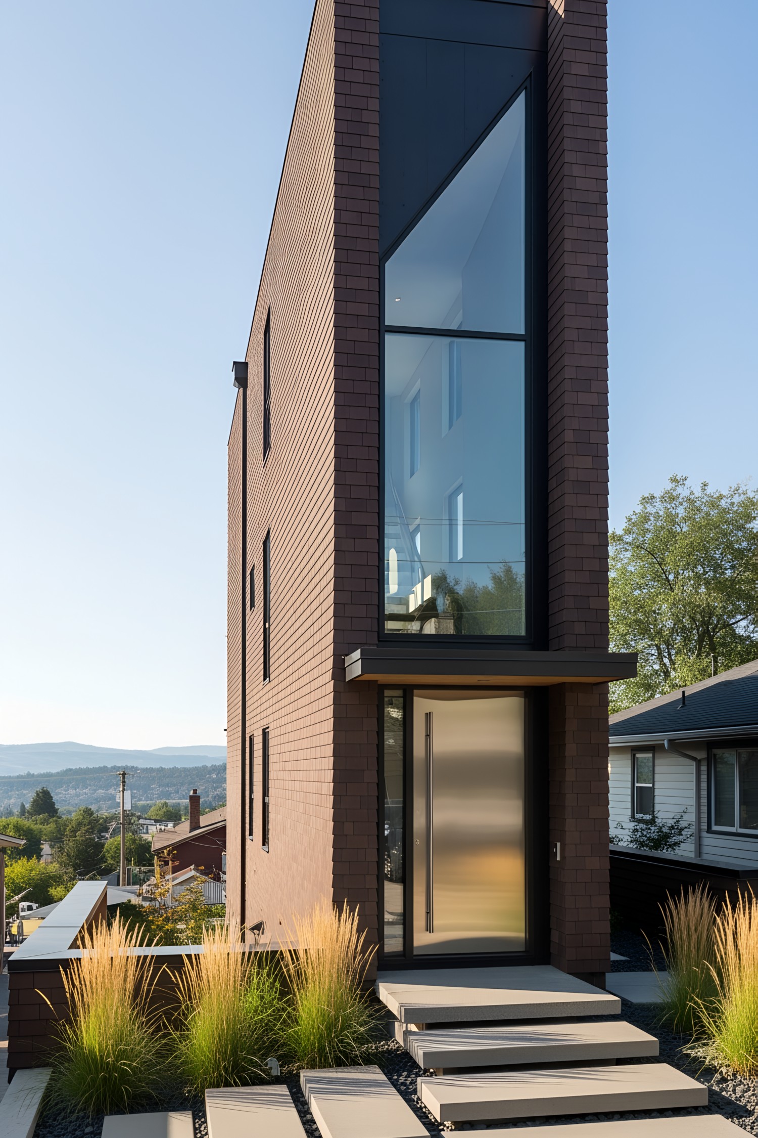 Tall house with large geometric windows