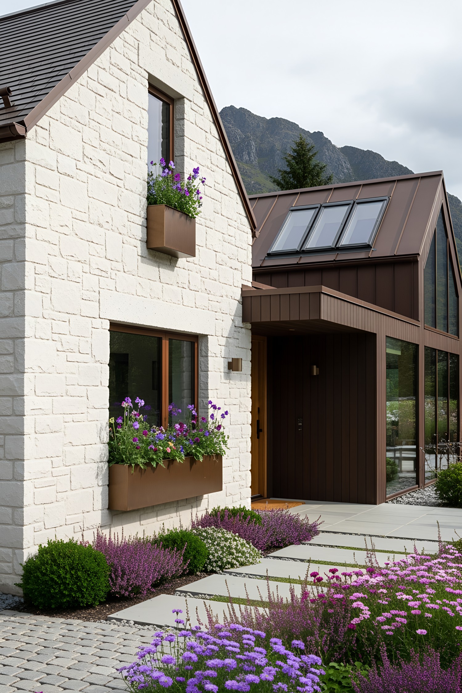 Cream stone house with purple flower boxes