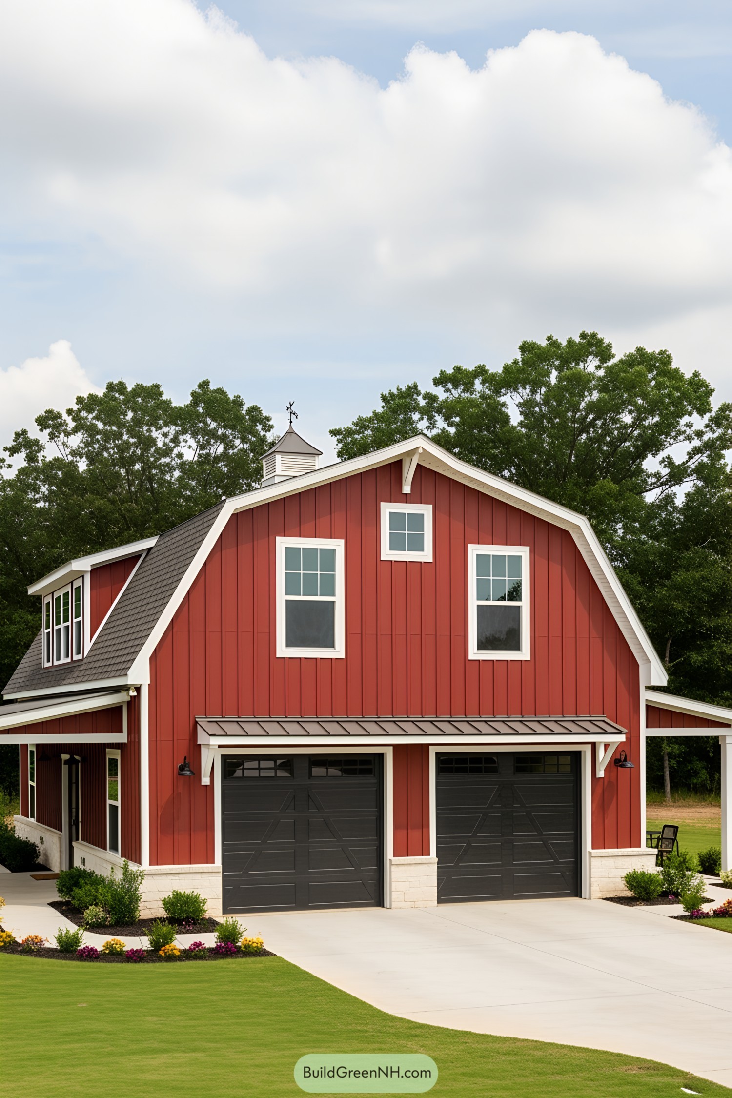 Charming red barndominium with large garage and lush lawn